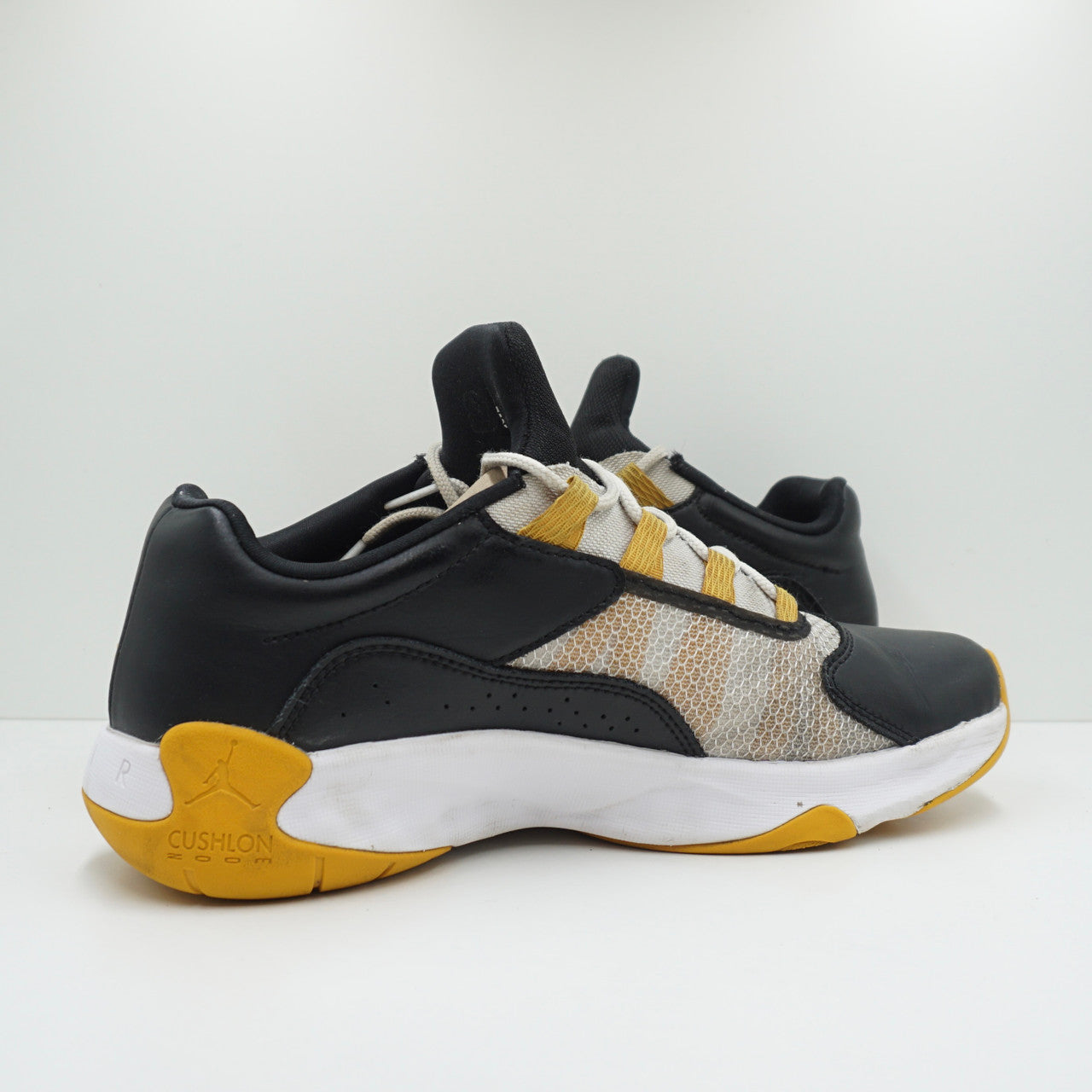 Jordan 11 CMFT Low Black Gold White