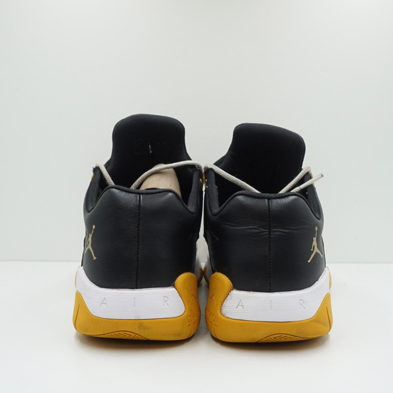 Jordan 11 CMFT Low Black Gold White