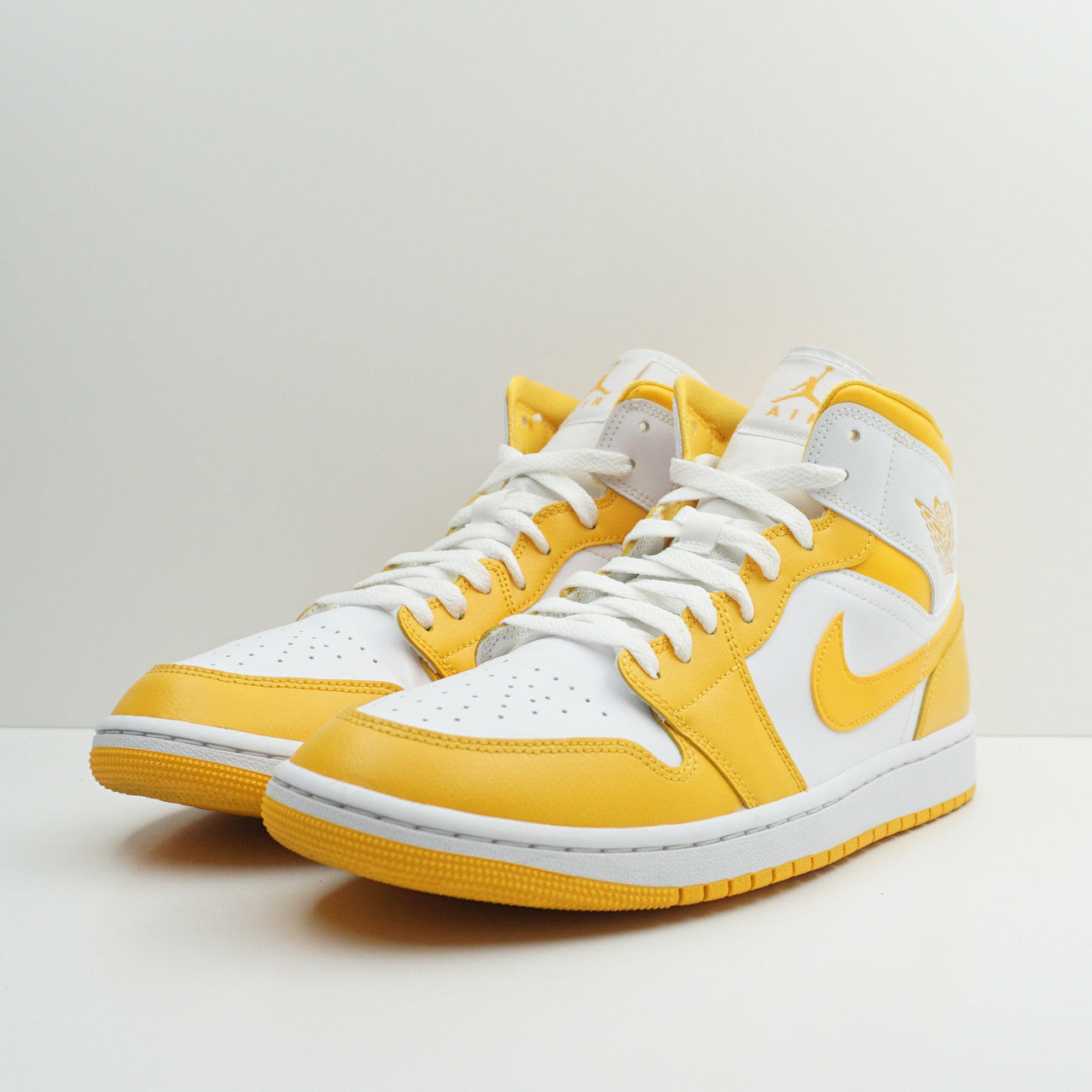 Jordan 1 Mid White University Gold (W)
