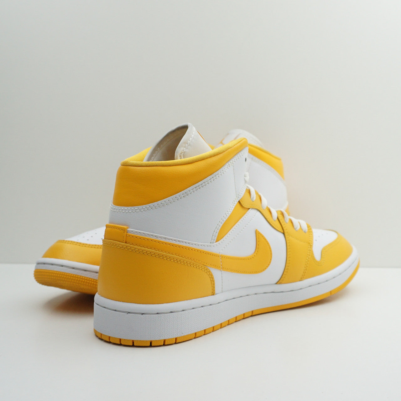Jordan 1 Mid White University Gold (W)
