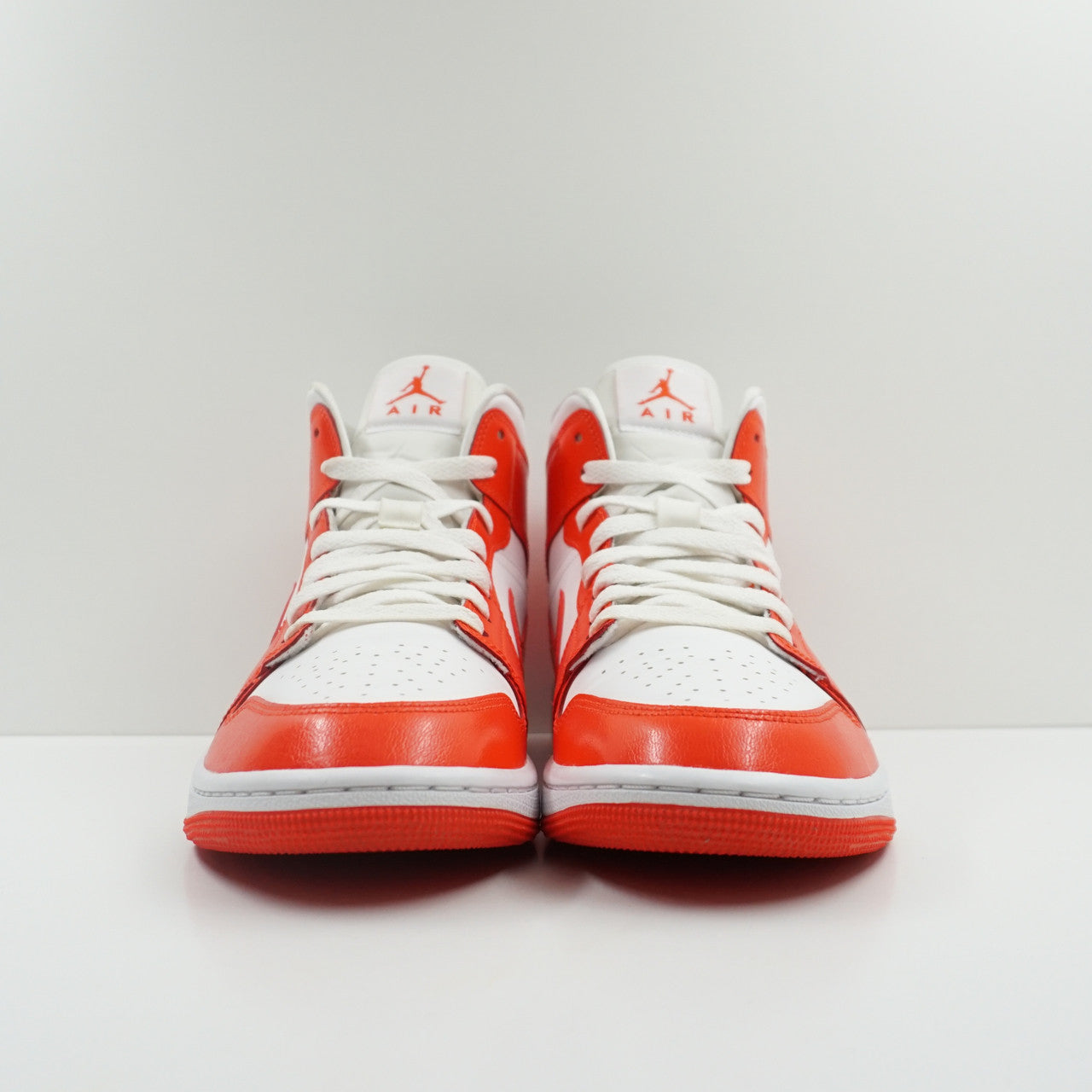 Jordan 1 Mid Syracuse (W)