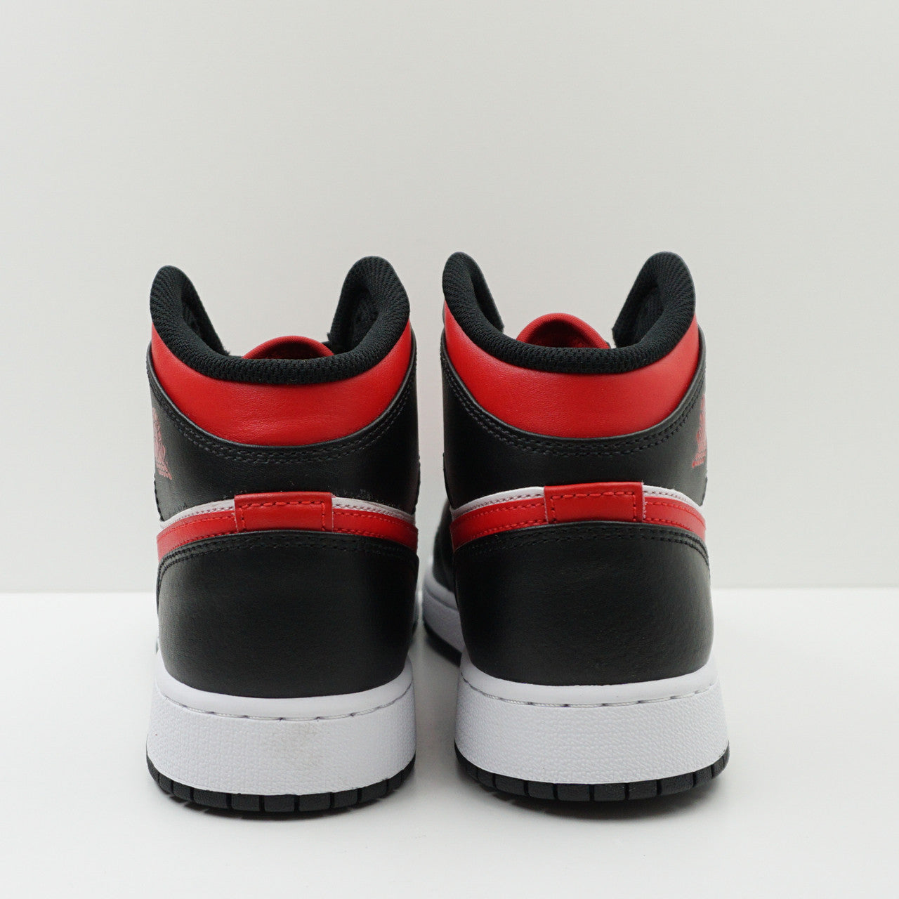 Jordan 1 Mid Black Fire Red (GS)