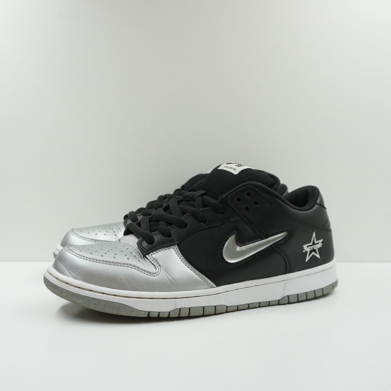 nike sb dunk low supreme jewel swoosh silver