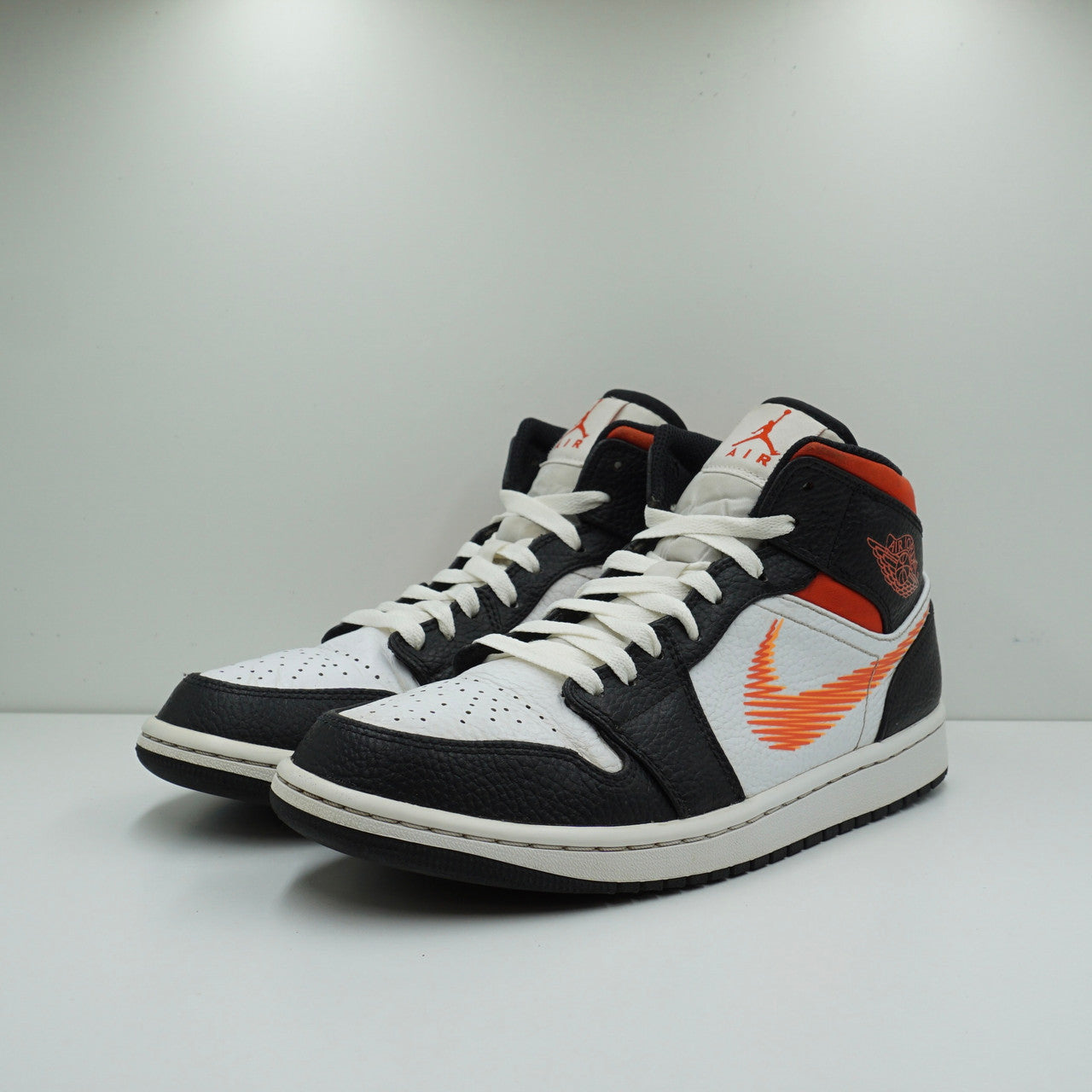 jordan 1 mid zig zag swoosh