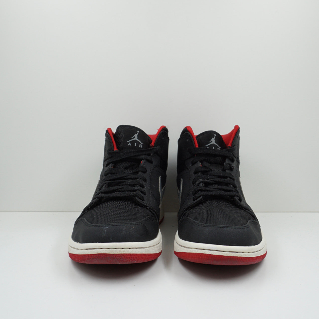 Jordan 1 Mid Black Cool Grey Gym Red