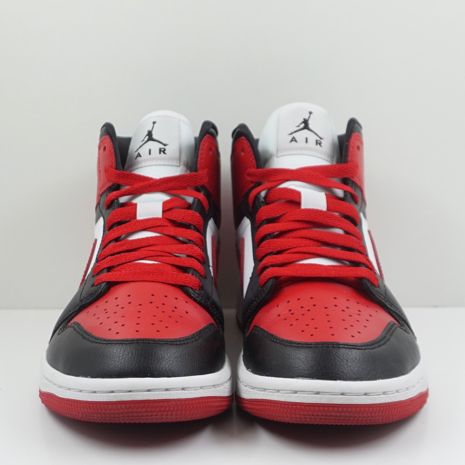 Jordan 1 Mid Alternate Bred Toe (W)