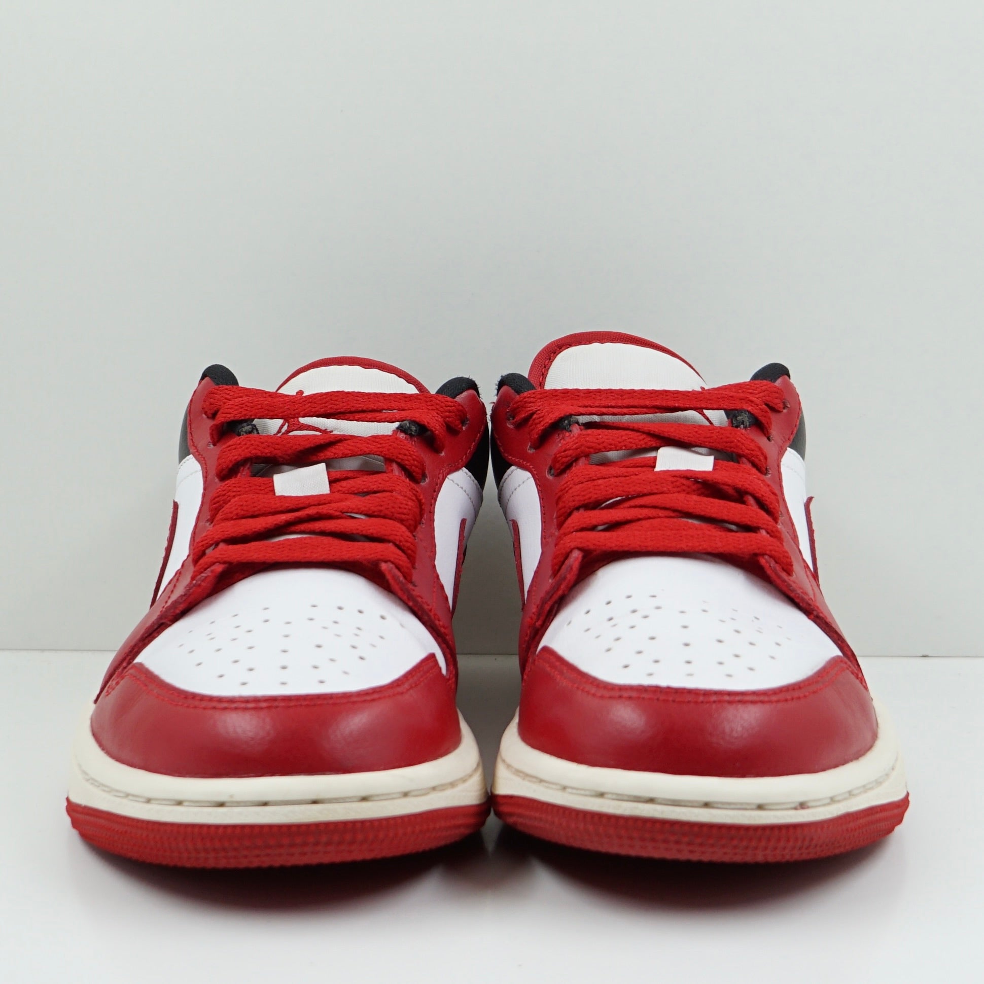 Jordan 1 Low Reverse Black Toe (W)