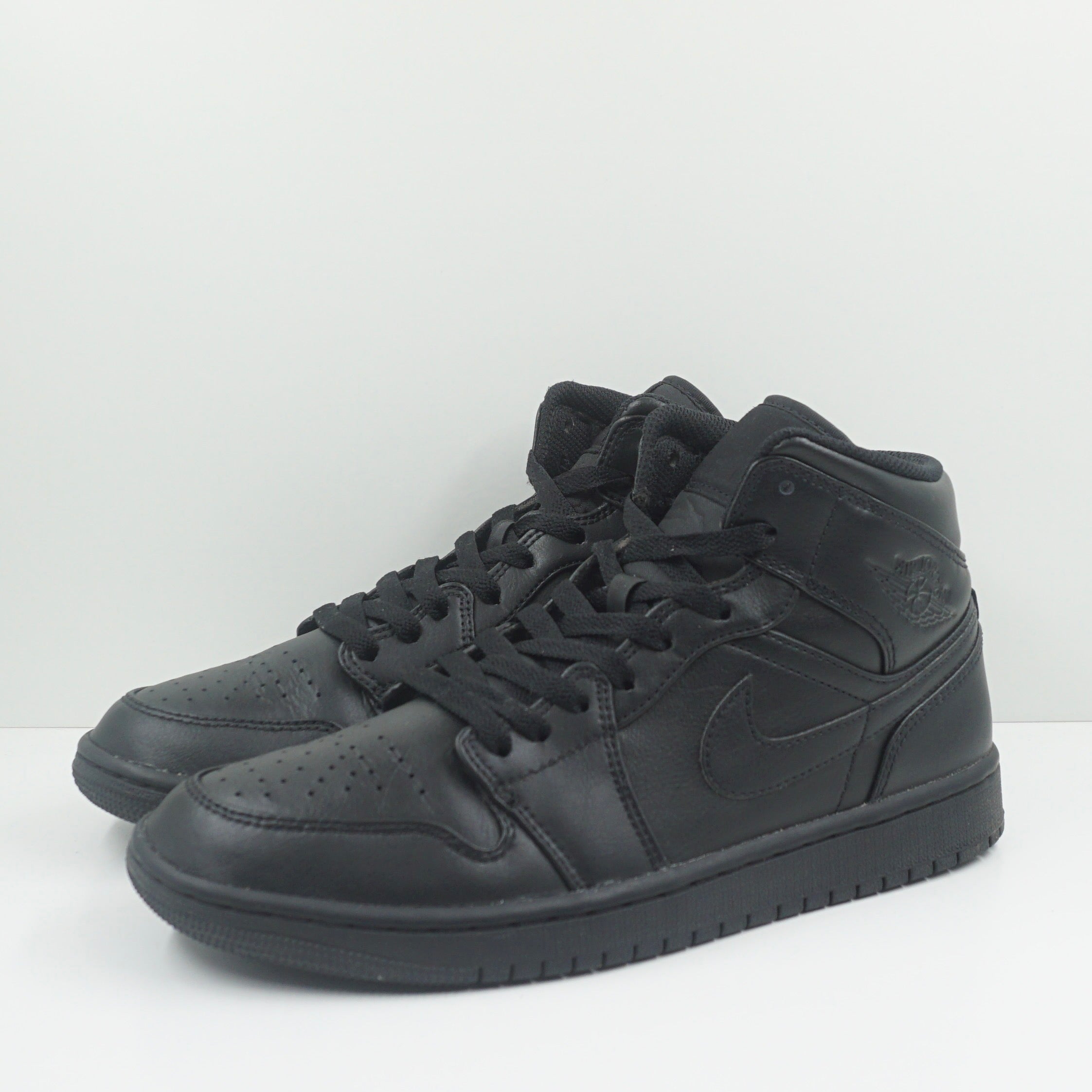 Jordan 1 Mid Triple Black