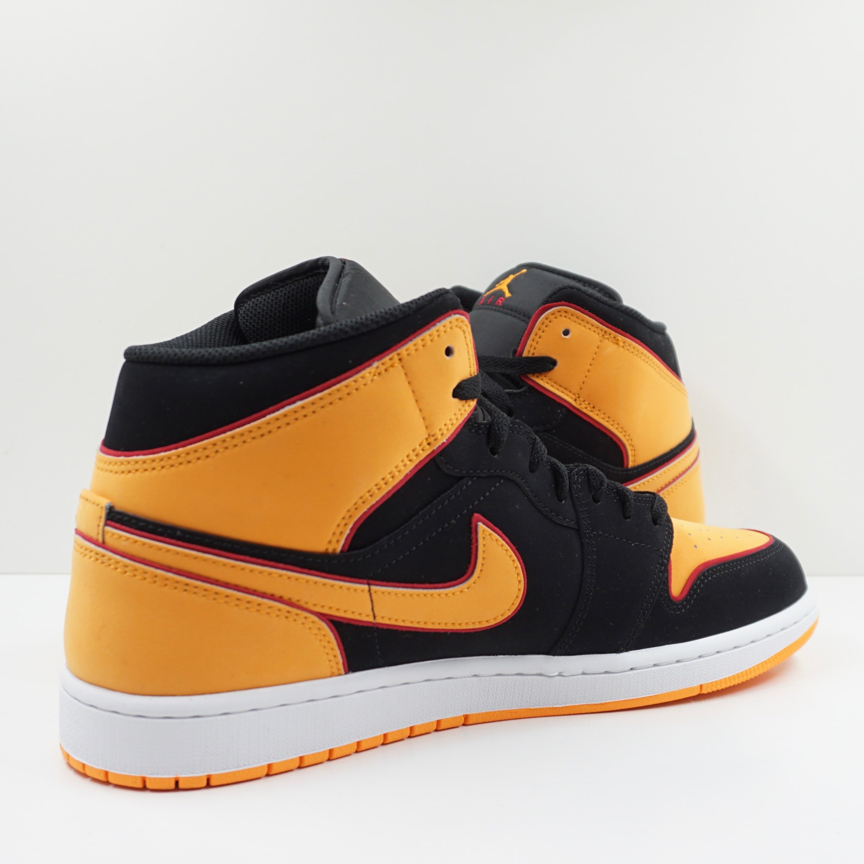 Jordan 1 Mid Fat Tongue Black Orange