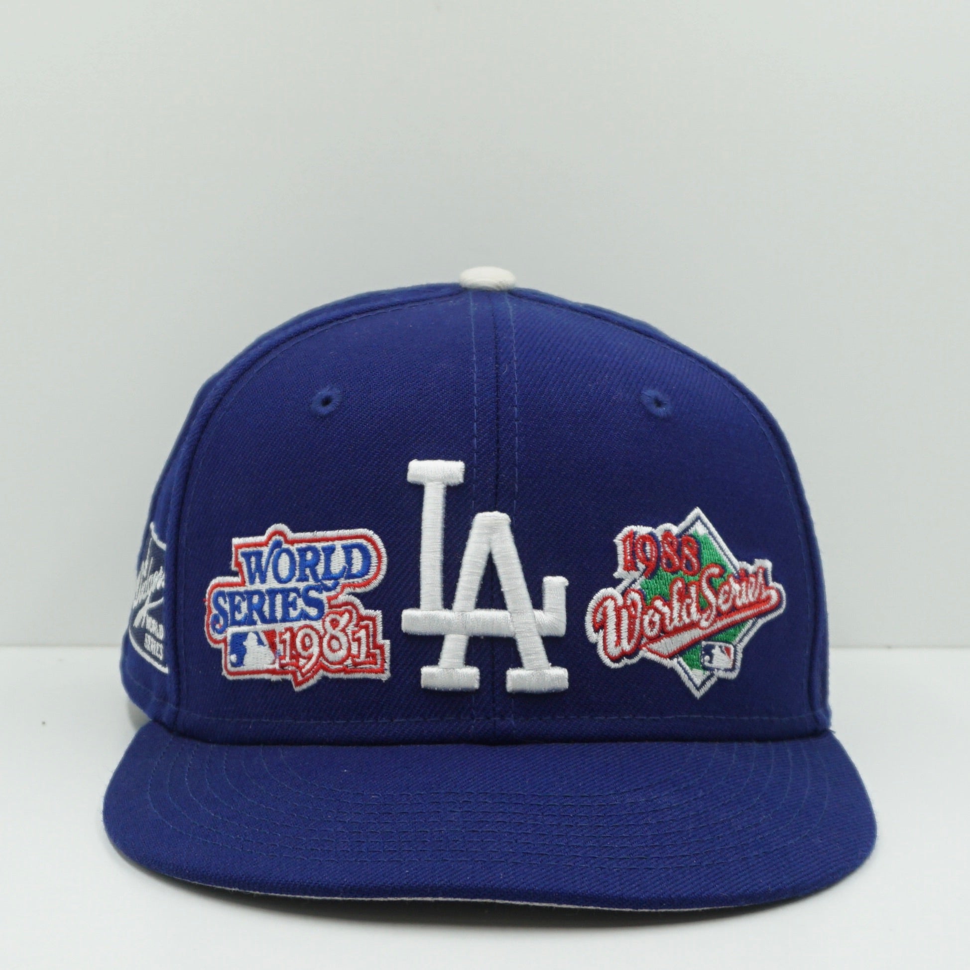 New Era Los Angeles Dodgers All Over World Series Dark Royal Blue Fitted Cap