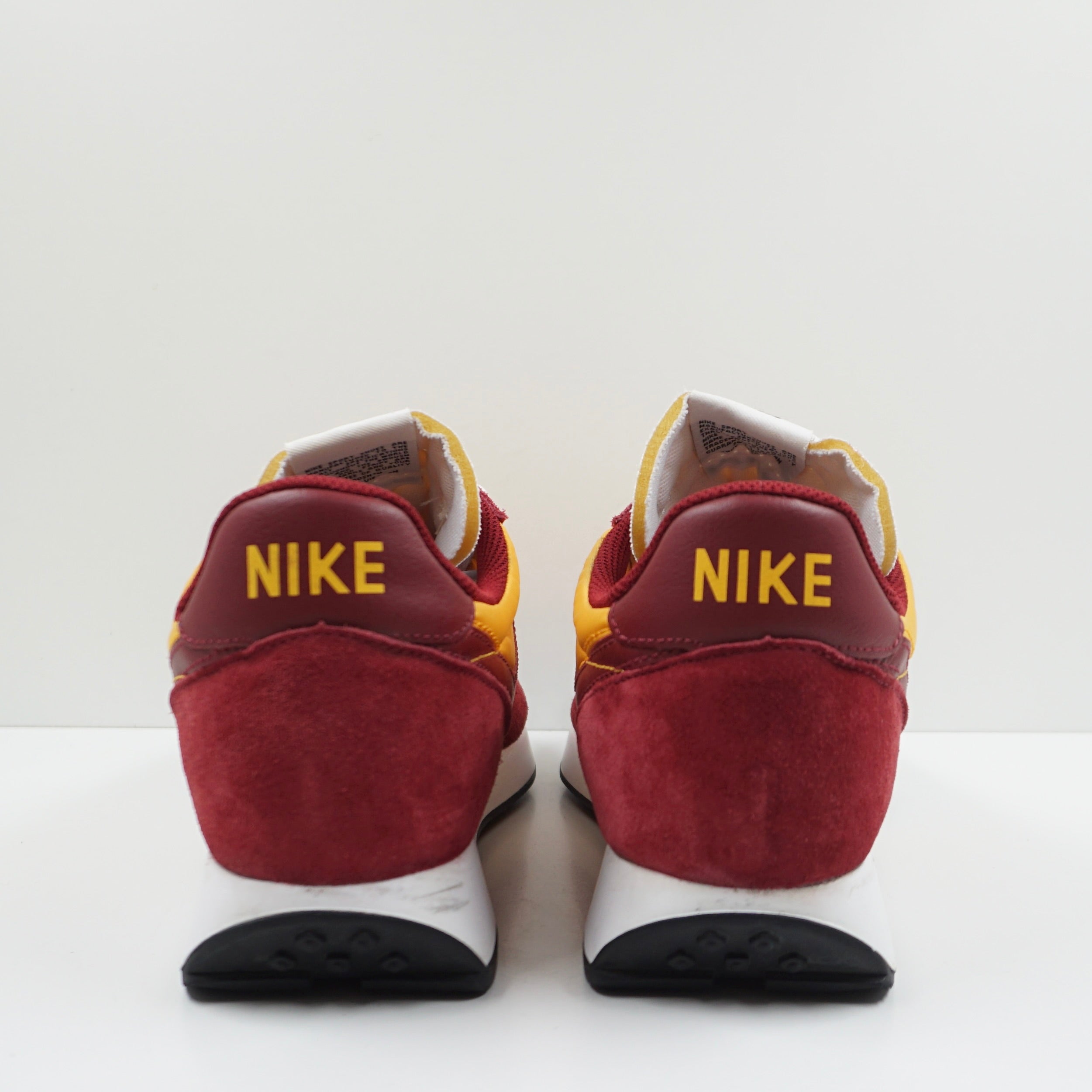 nike tailwind 79 university gold