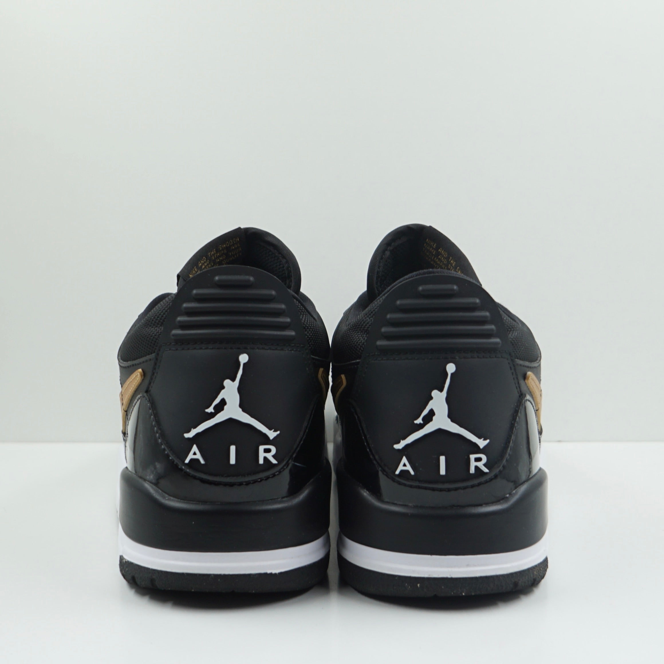 Jordan Legacy 312 Low Black Metallic Gold