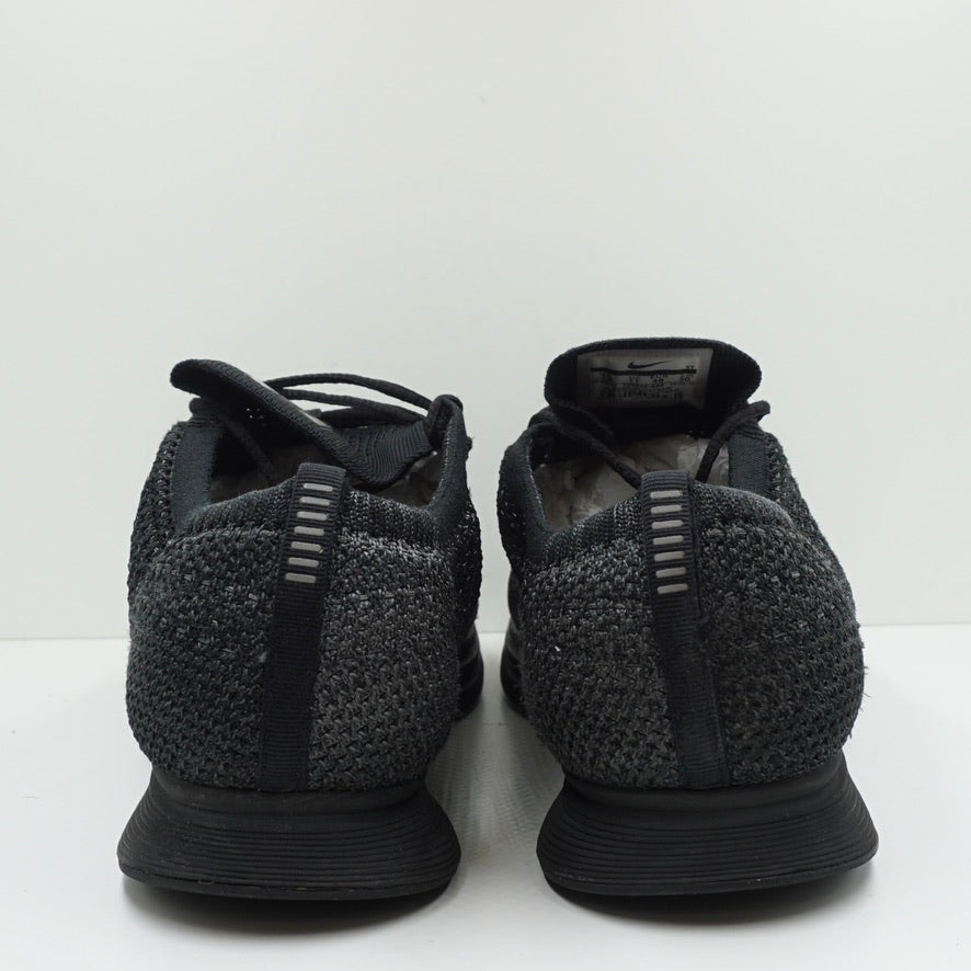 Nike flyknit racer triple black mens hotsell