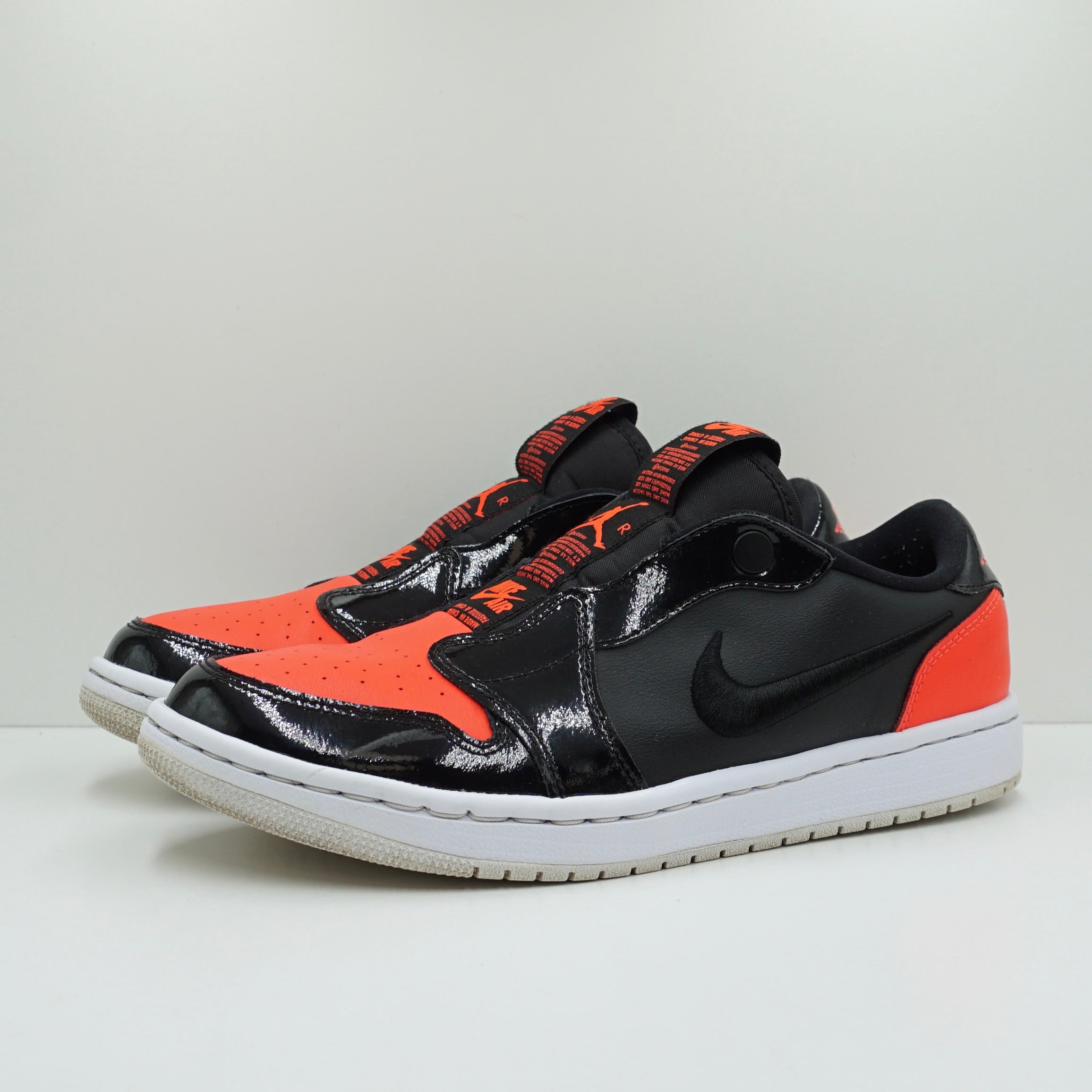Jordan 1 Low Slip Black Hot Punch (W)