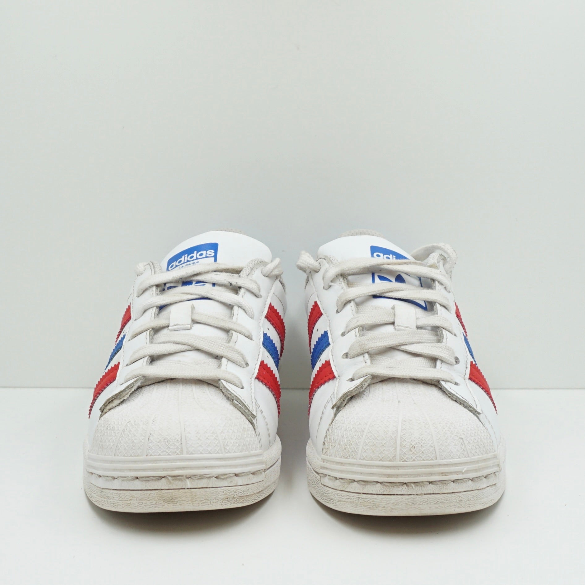 Adidas superstar blue and red stripes price hotsell