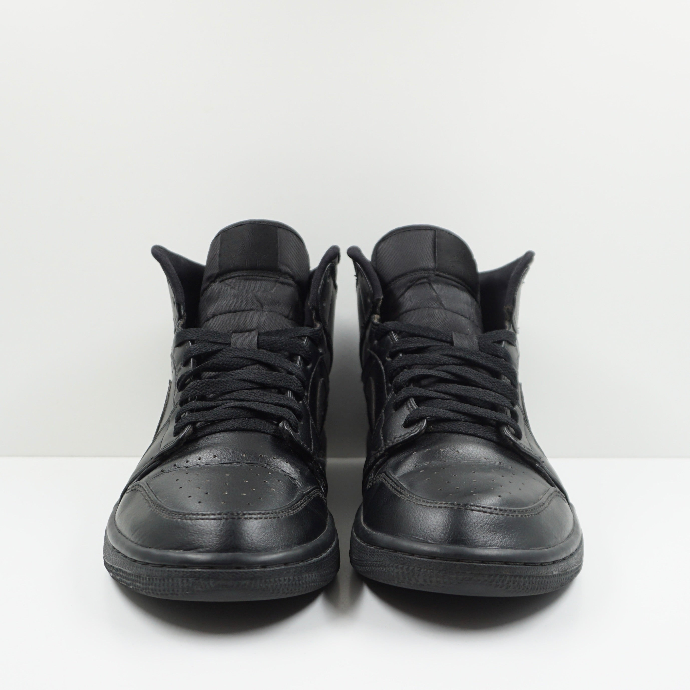 Jordan 1 Mid Black