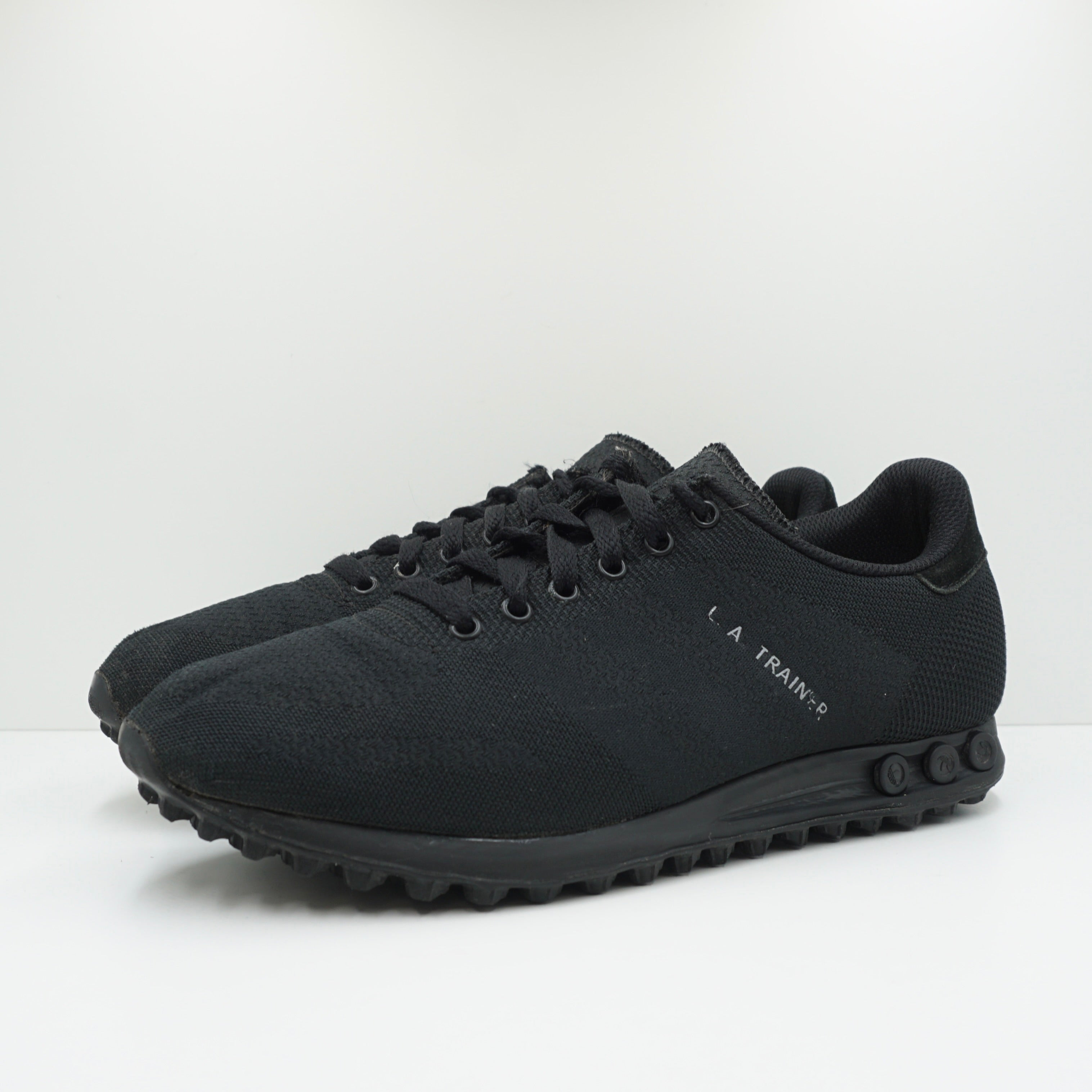 La trainer triple black on sale