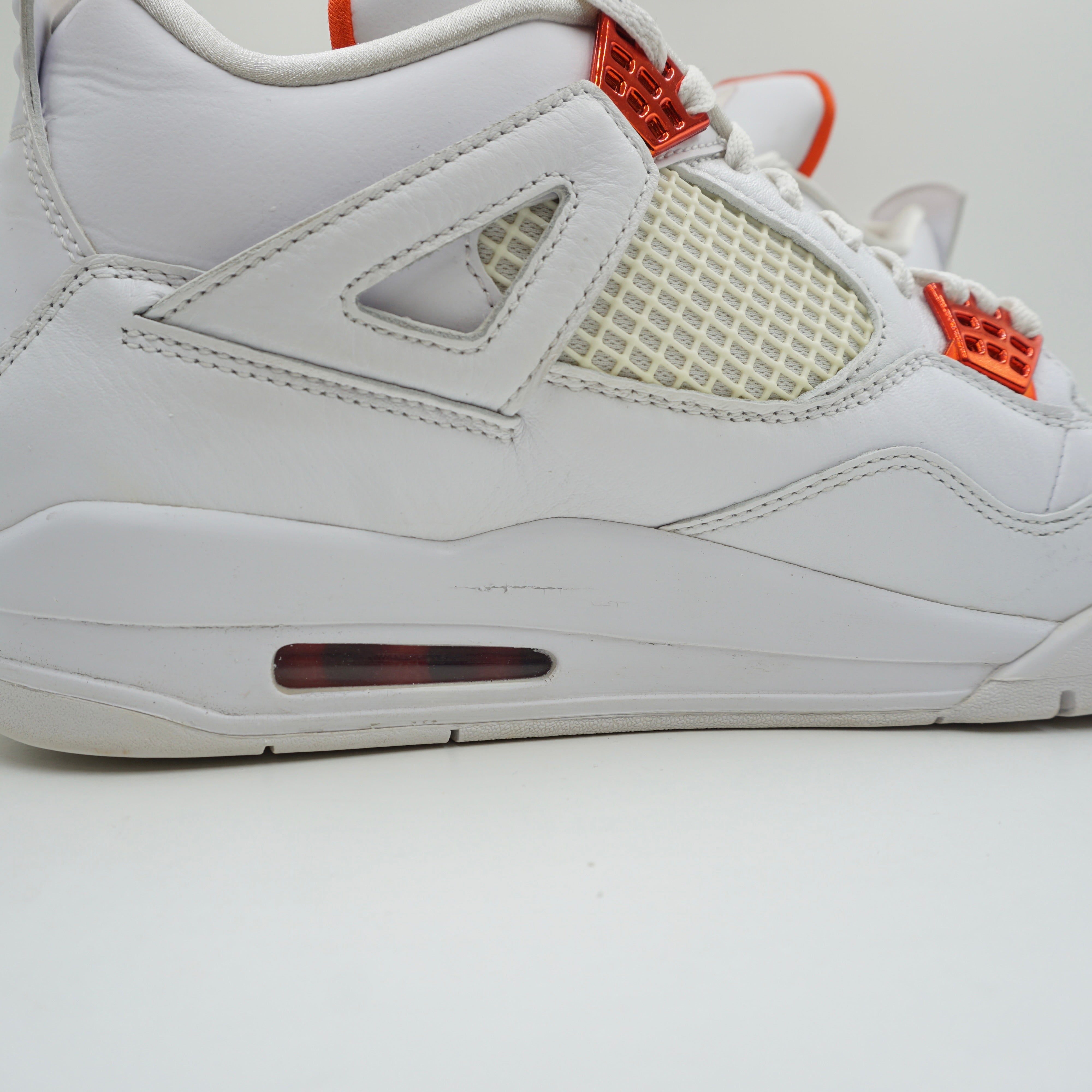 Jordan 4 Retro Metallic Orange