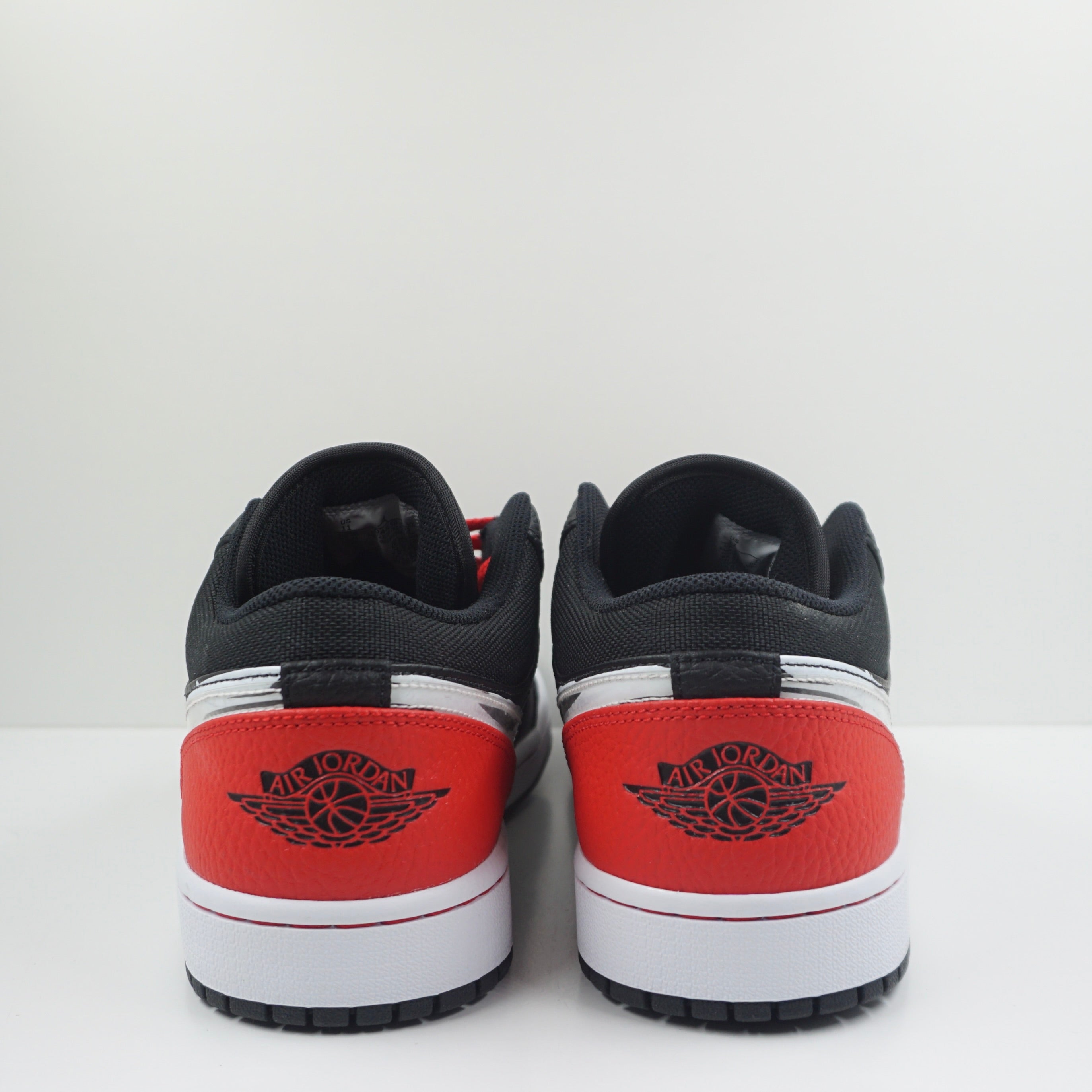 Jordan 1 Low Brushstroke Swoosh Black