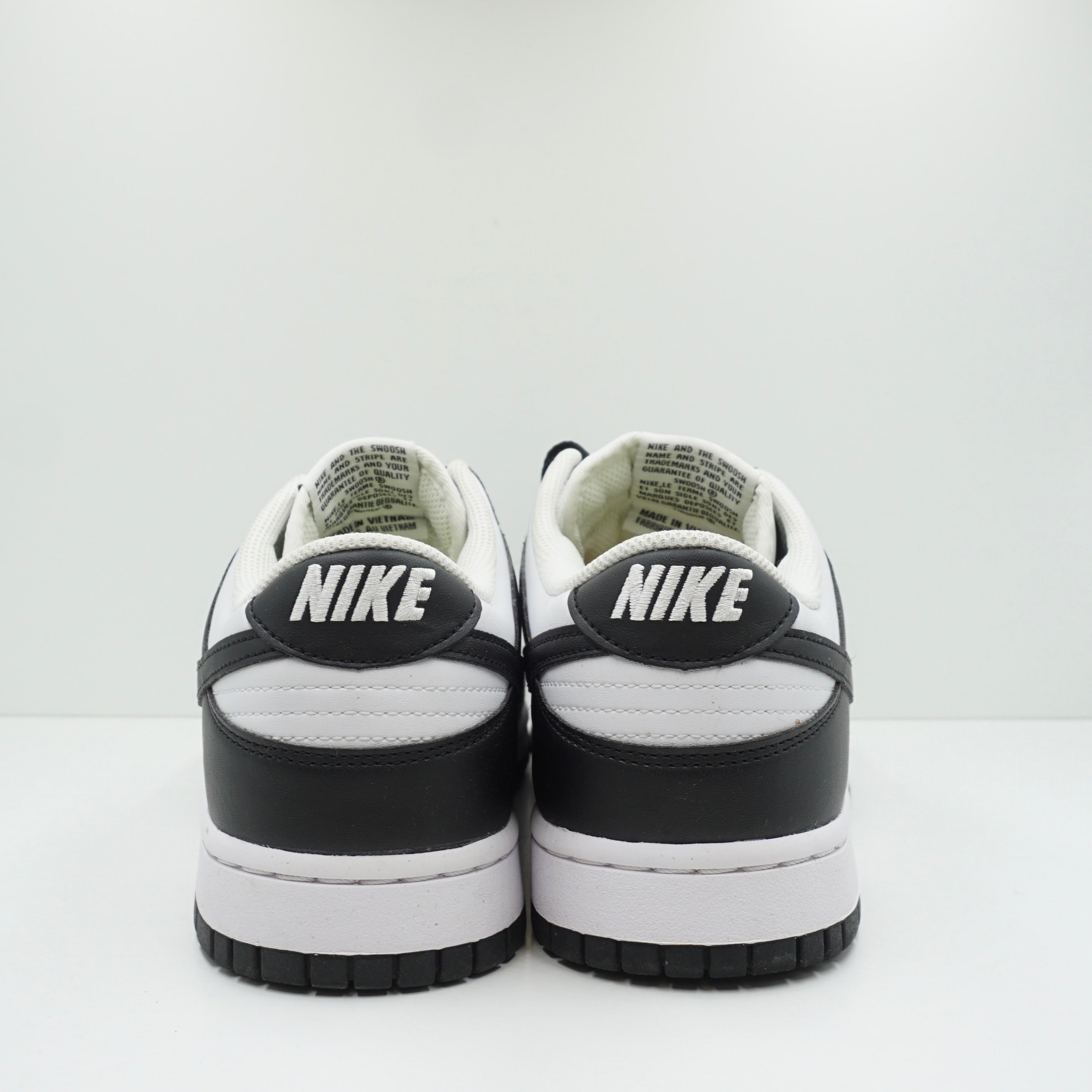 nike dunk low next nature black and white