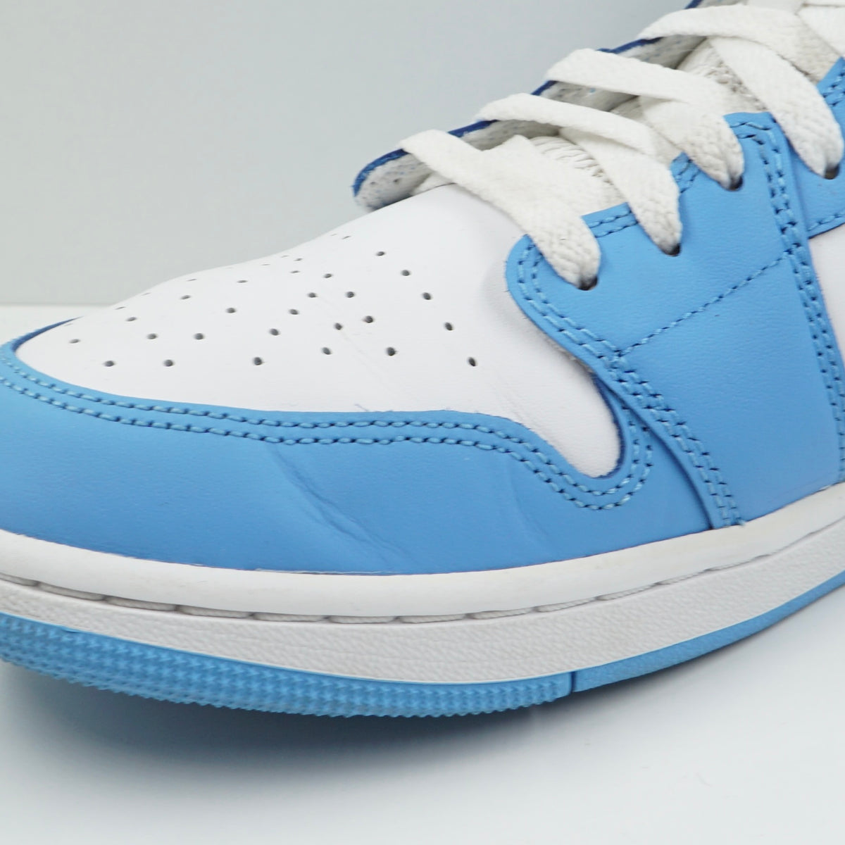 Jordan 1 Mid University Blue Grey