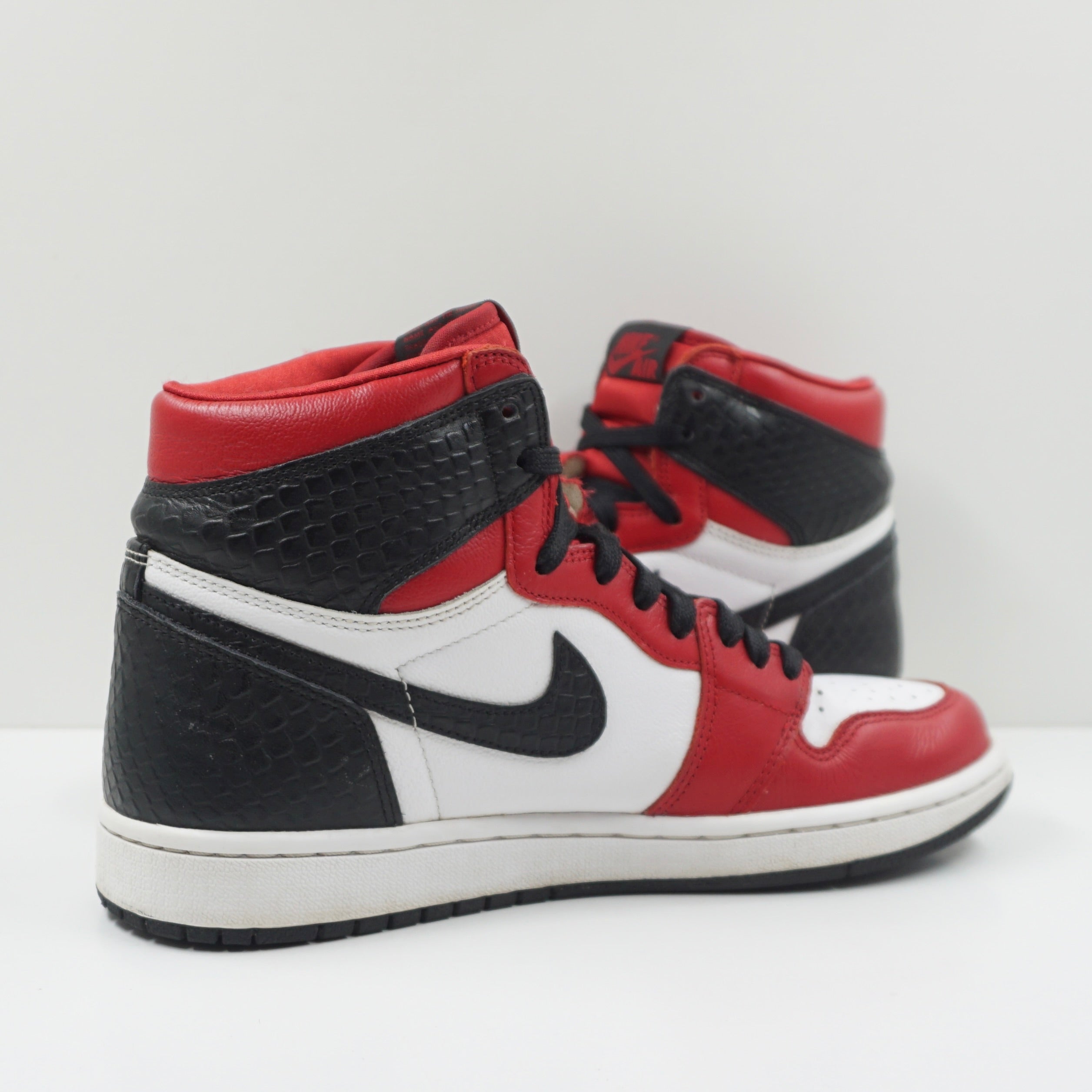 Jordan 1 Retro High Satin Snake Chicago (W)