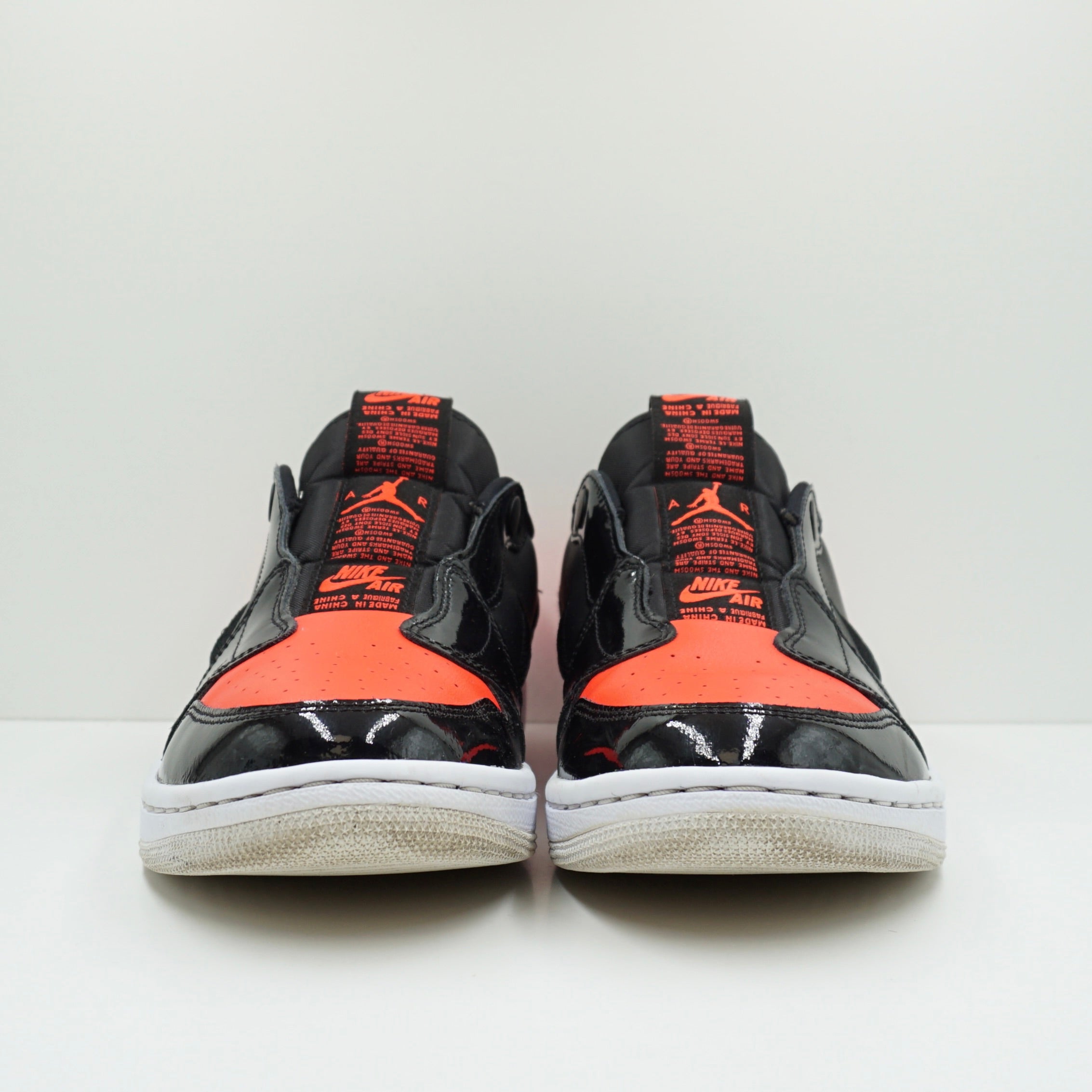 Jordan 1 Low Slip Black Hot Punch (W)