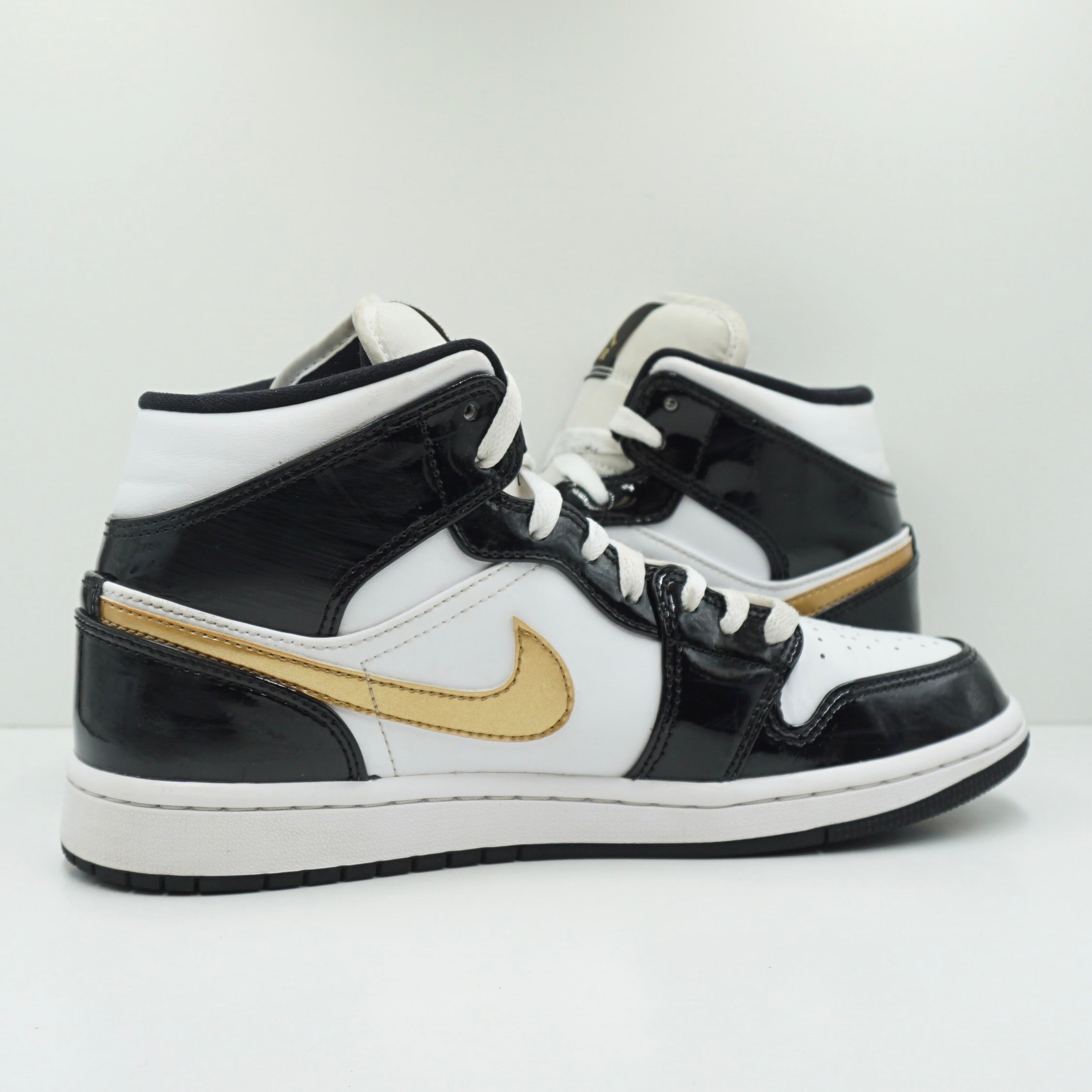Jordan 1 Mid Patent Black White Gold