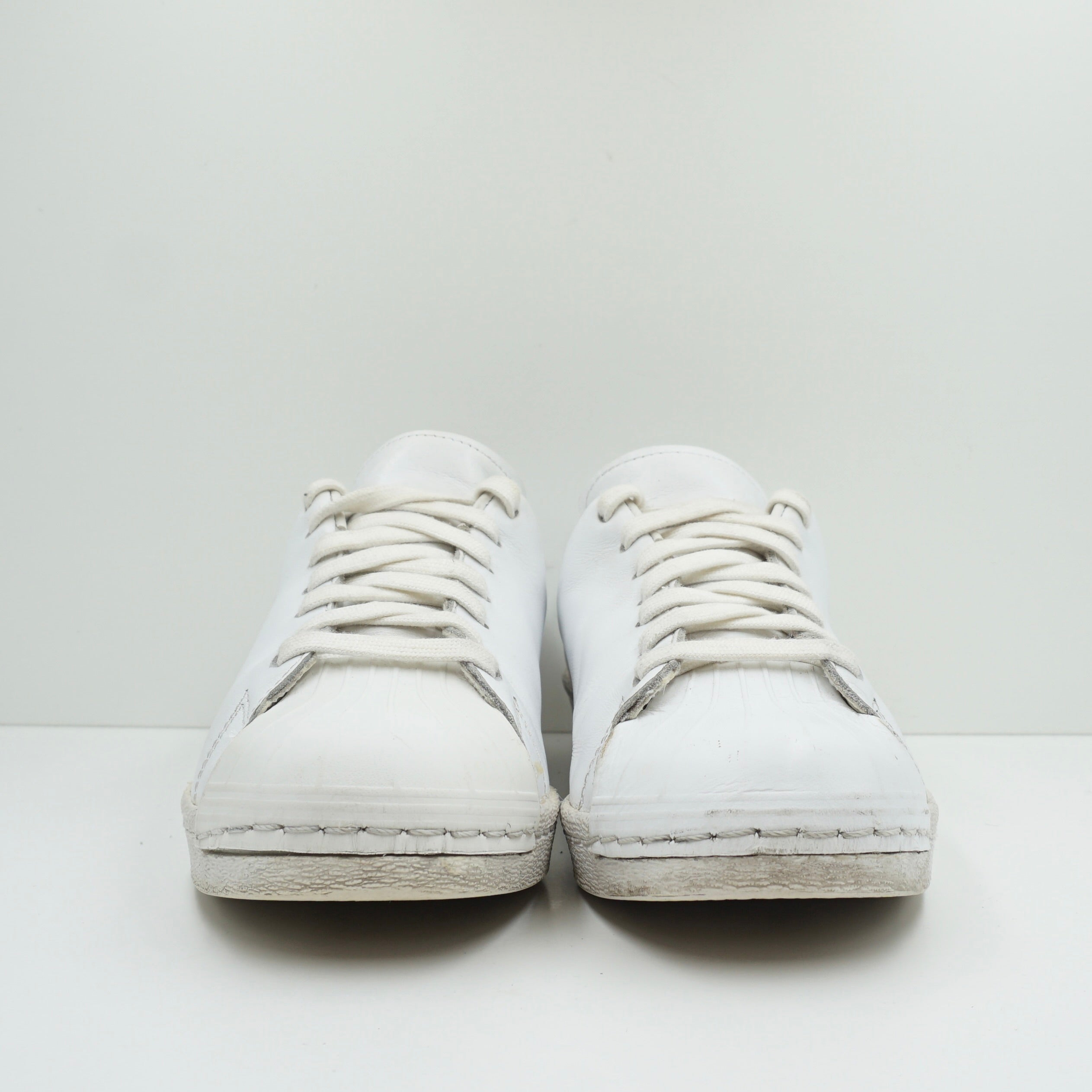 How to clean white superstar slip on best sale