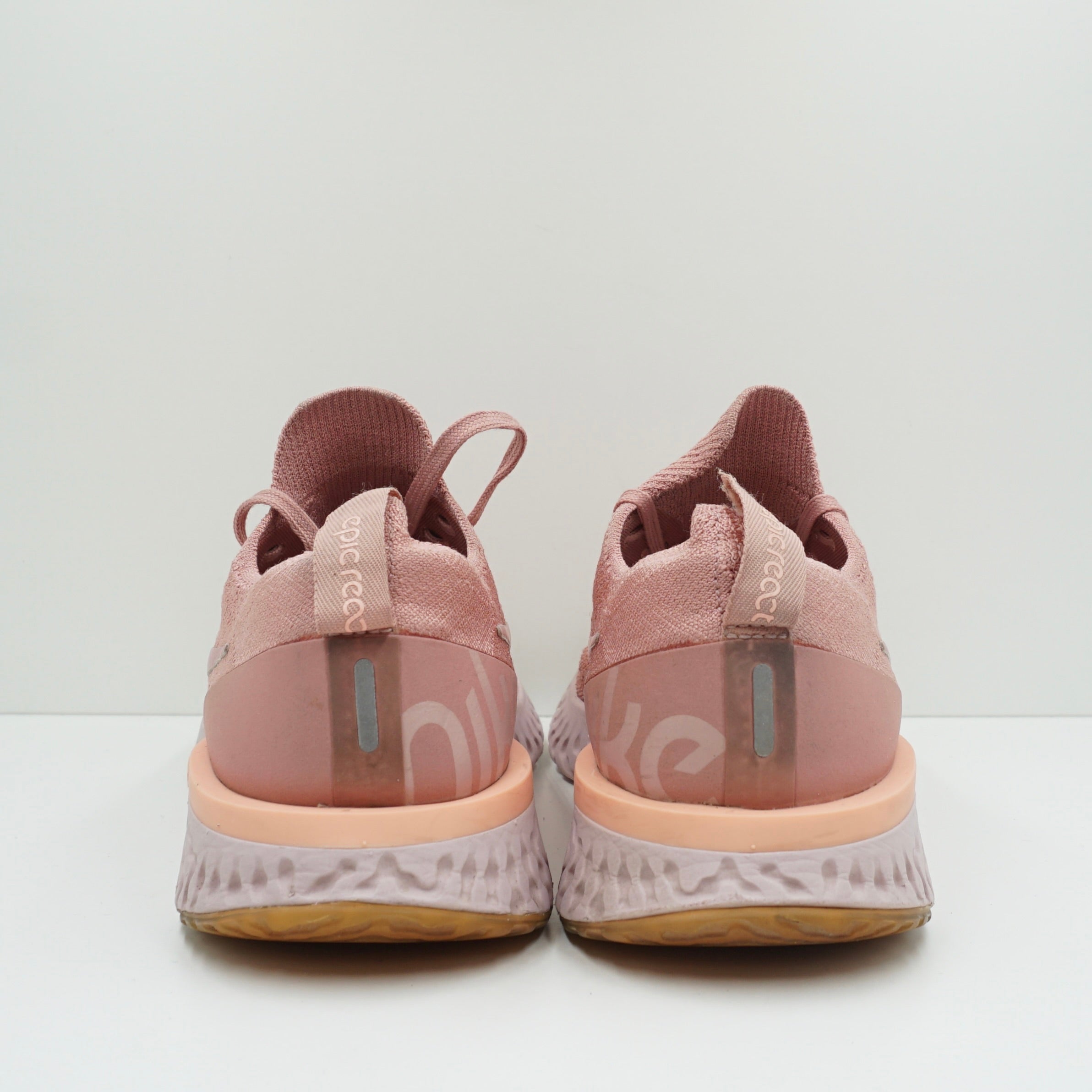 Nike epic react flyknit light pink hotsell