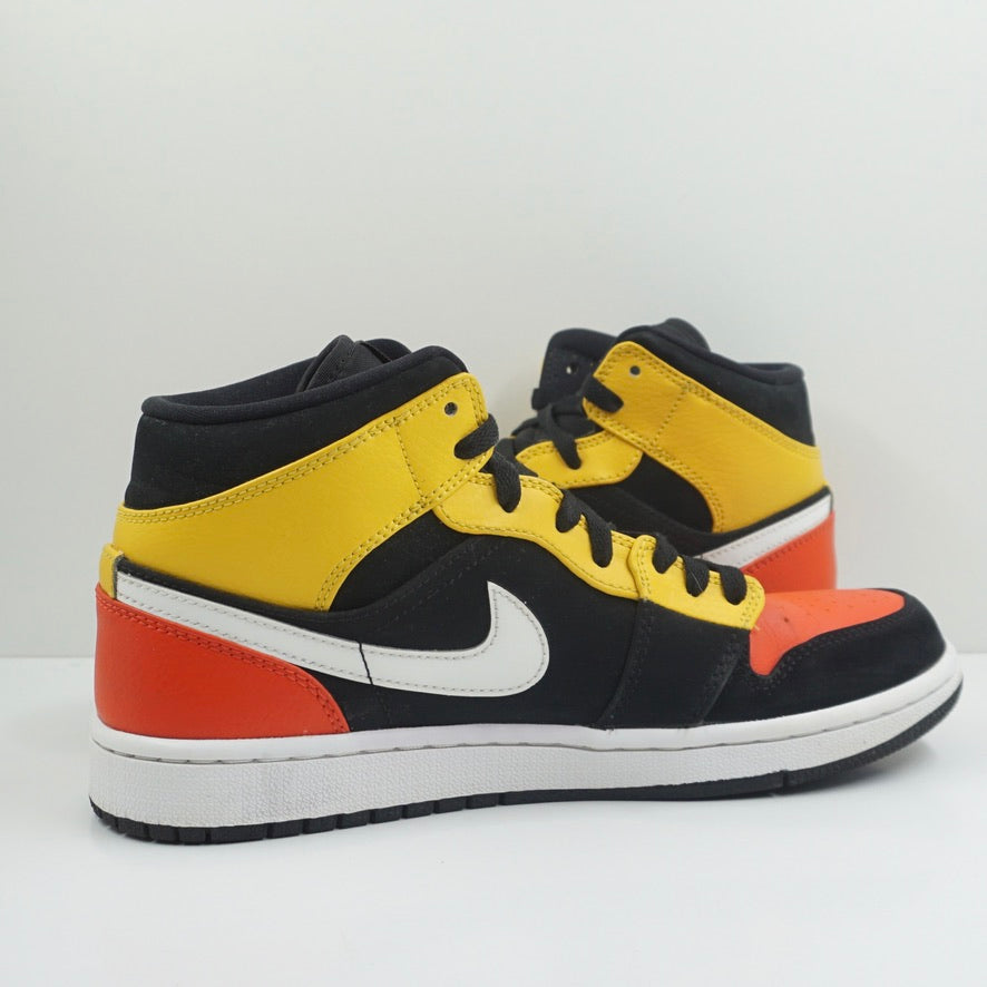 Jordan 1 Mid Black Amarillo Orange