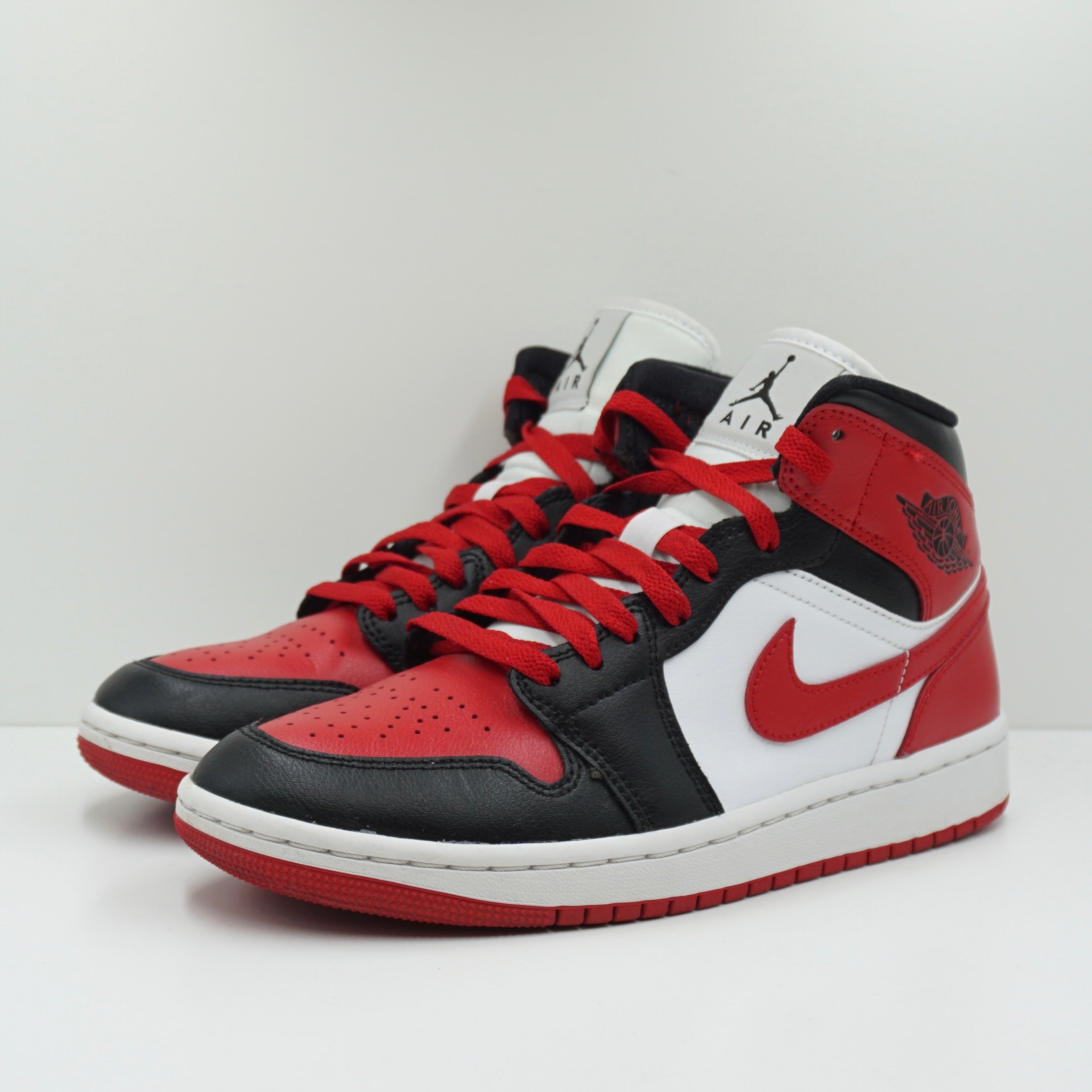 Jordan 1 Mid Alternate Bred Toe (W)