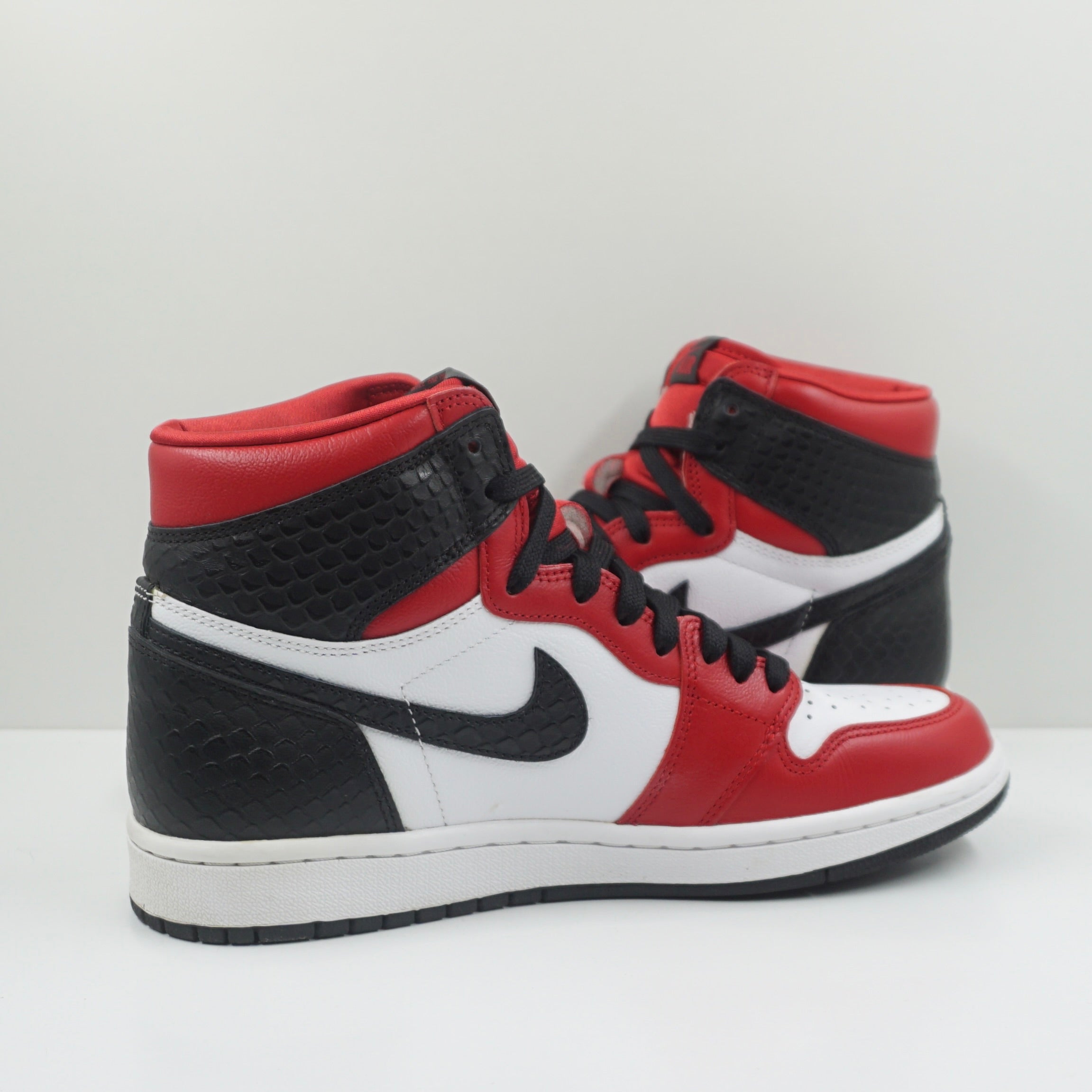 Jordan 1 Retro High Satin Snake Chicago (W)