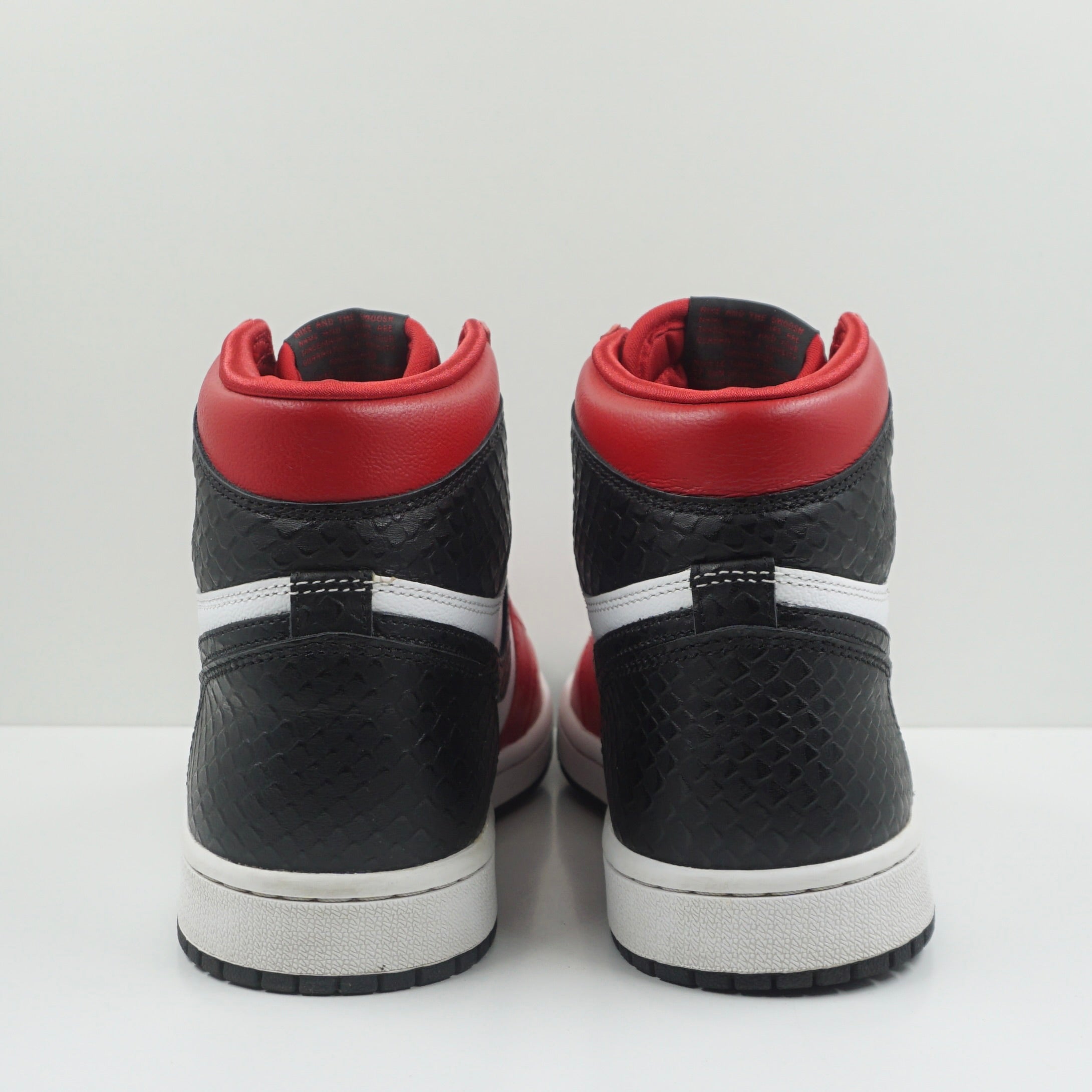 Jordan 1 Retro High Satin Snake Chicago (W)