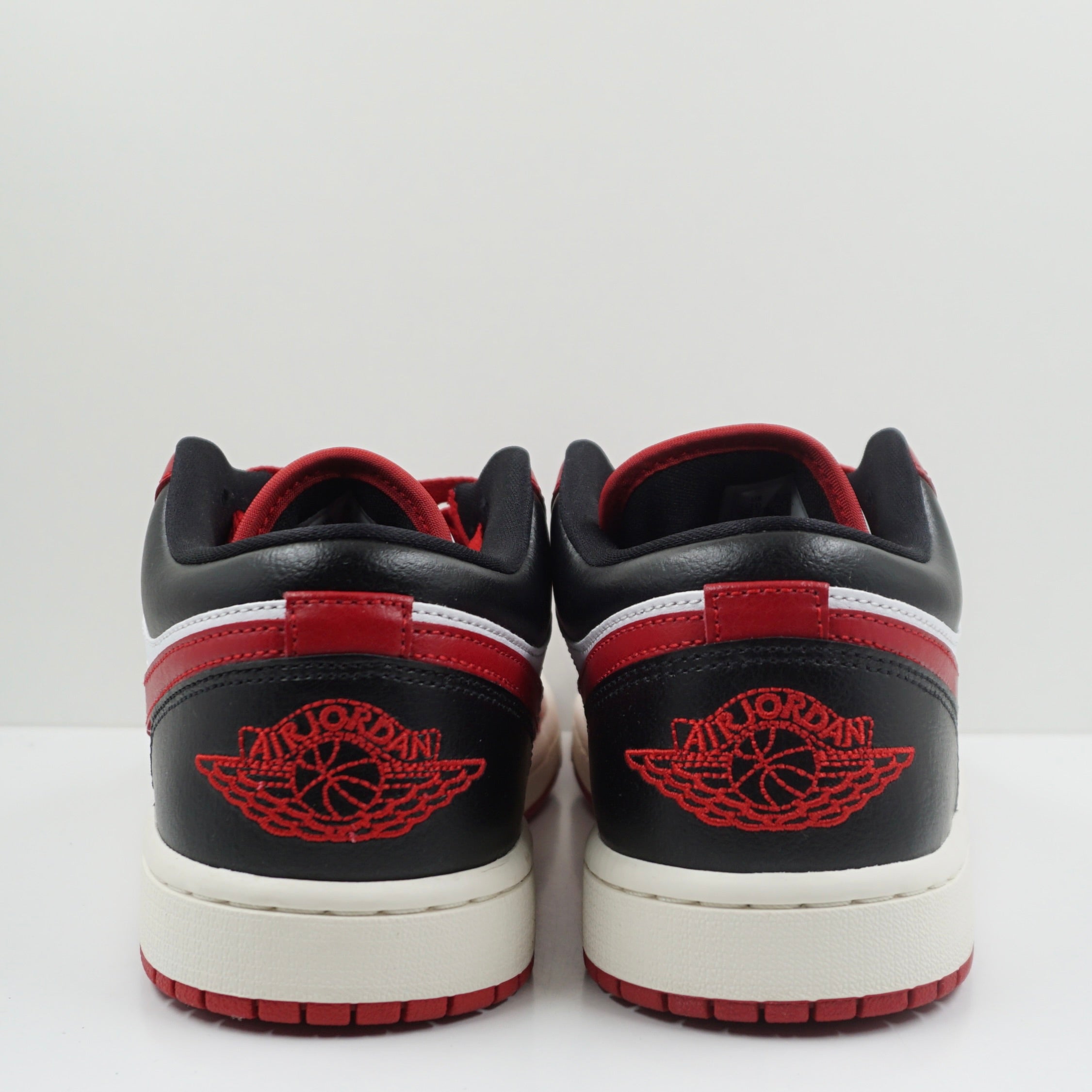 Jordan 1 Low Reverse Black Toe (W)
