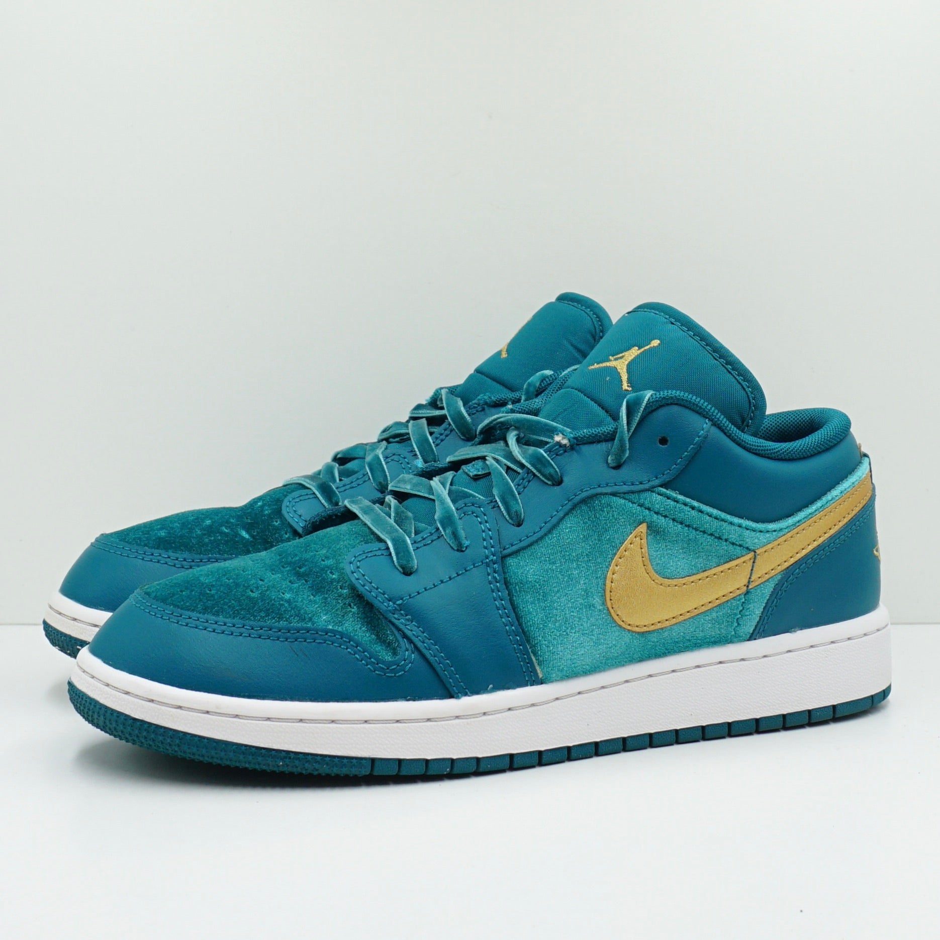 teal and gold jordans