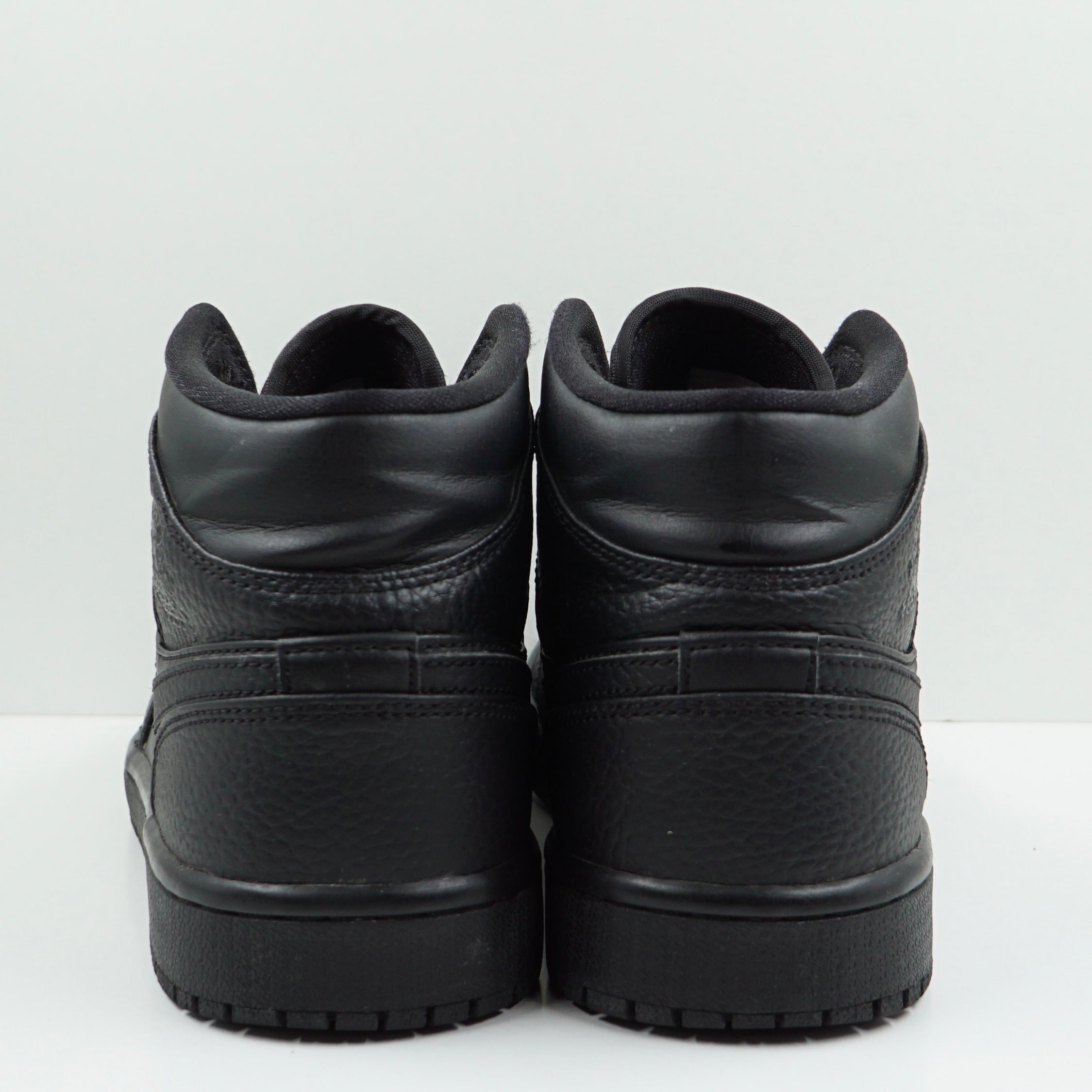 Jordan 1 Mid Triple Black