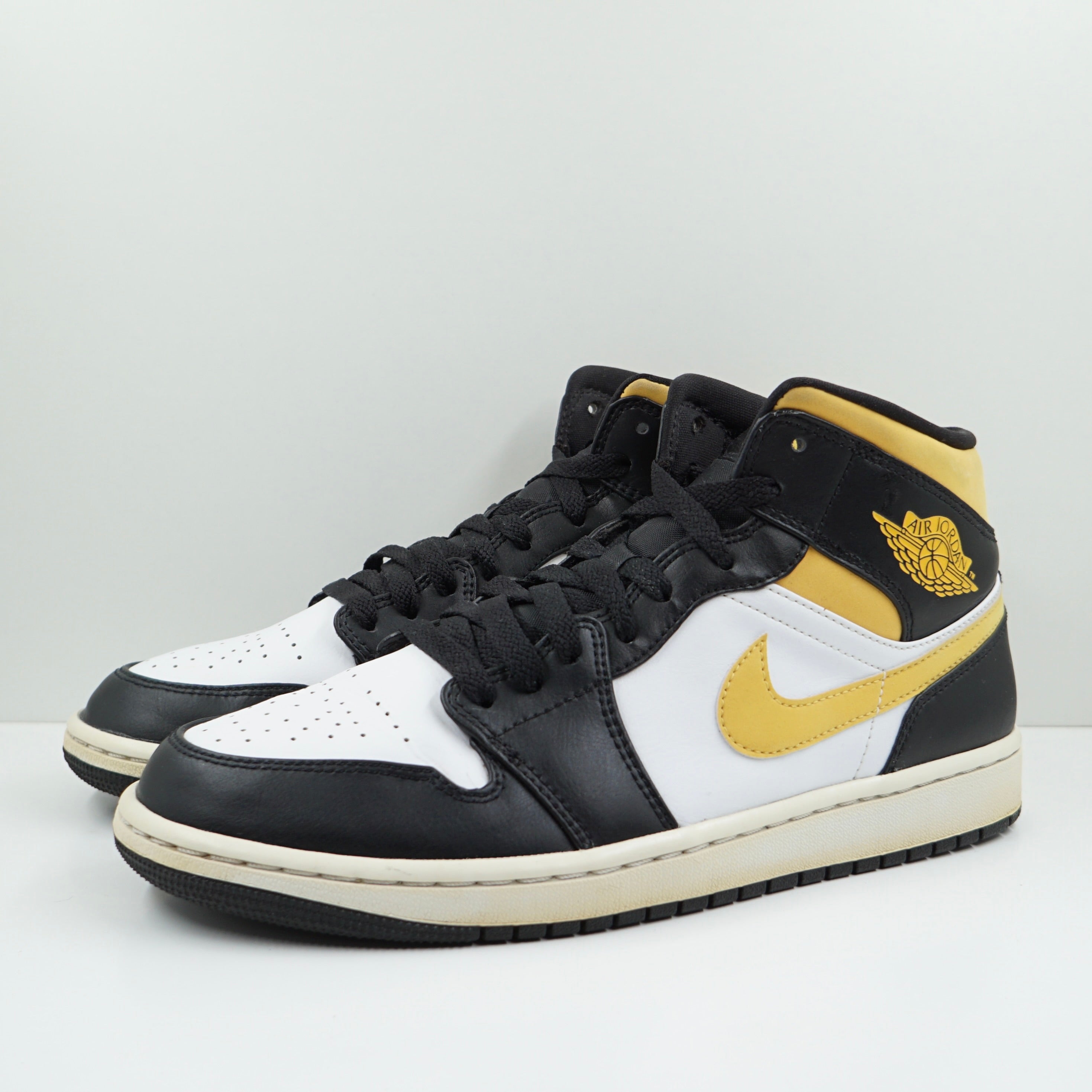 Jordan 1 Mid White Pollen Black