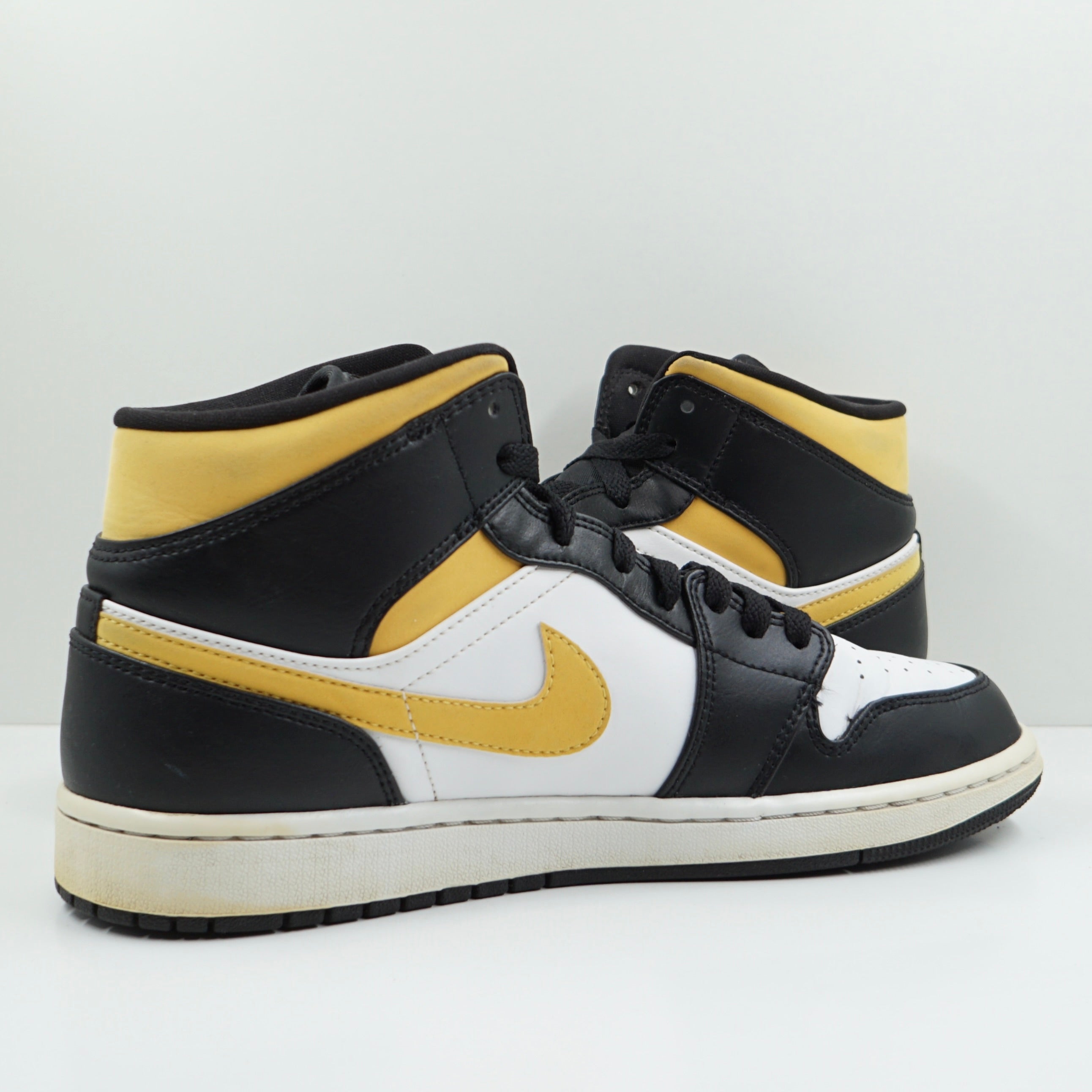 Jordan 1 Mid White Pollen Black