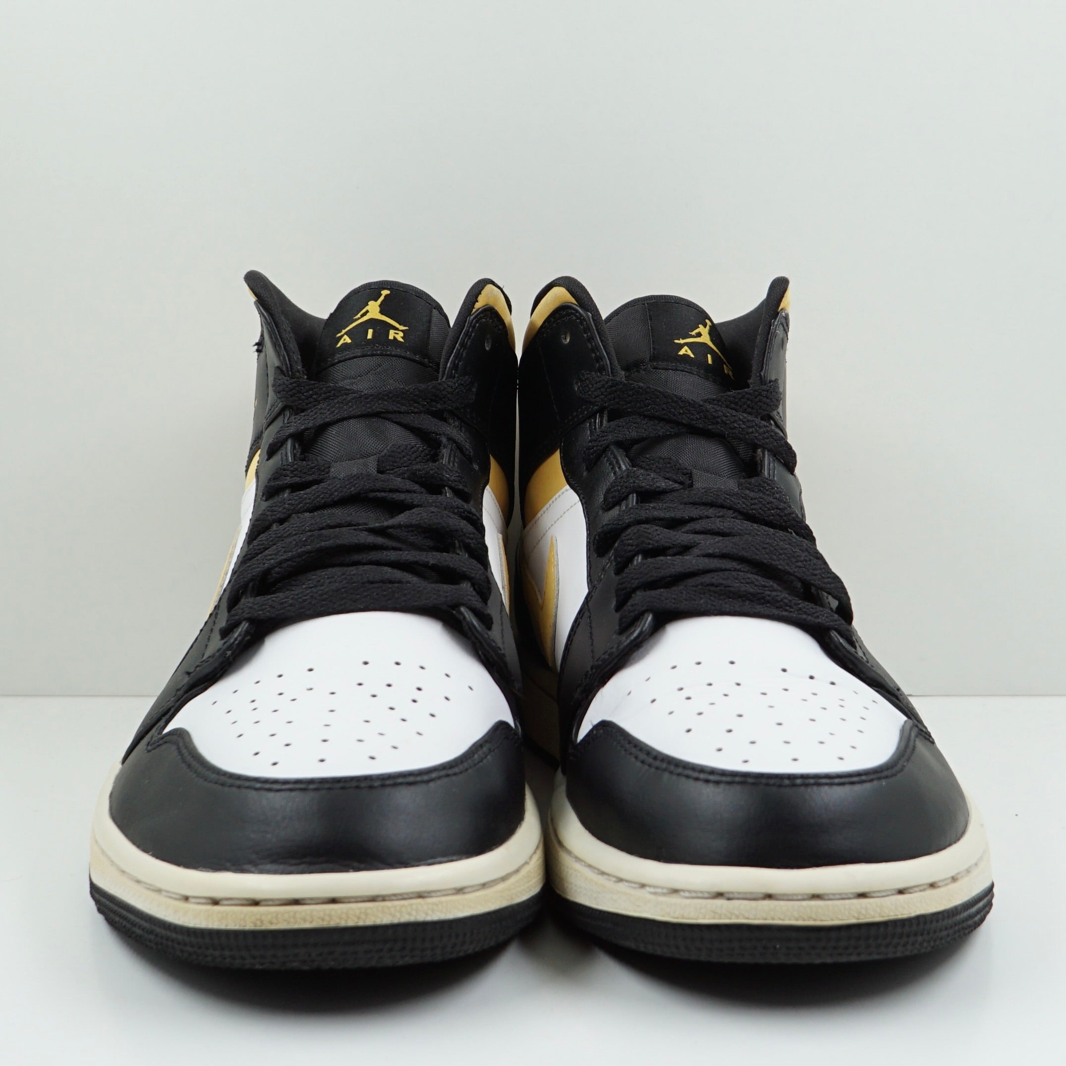 Jordan 1 Mid White Pollen Black