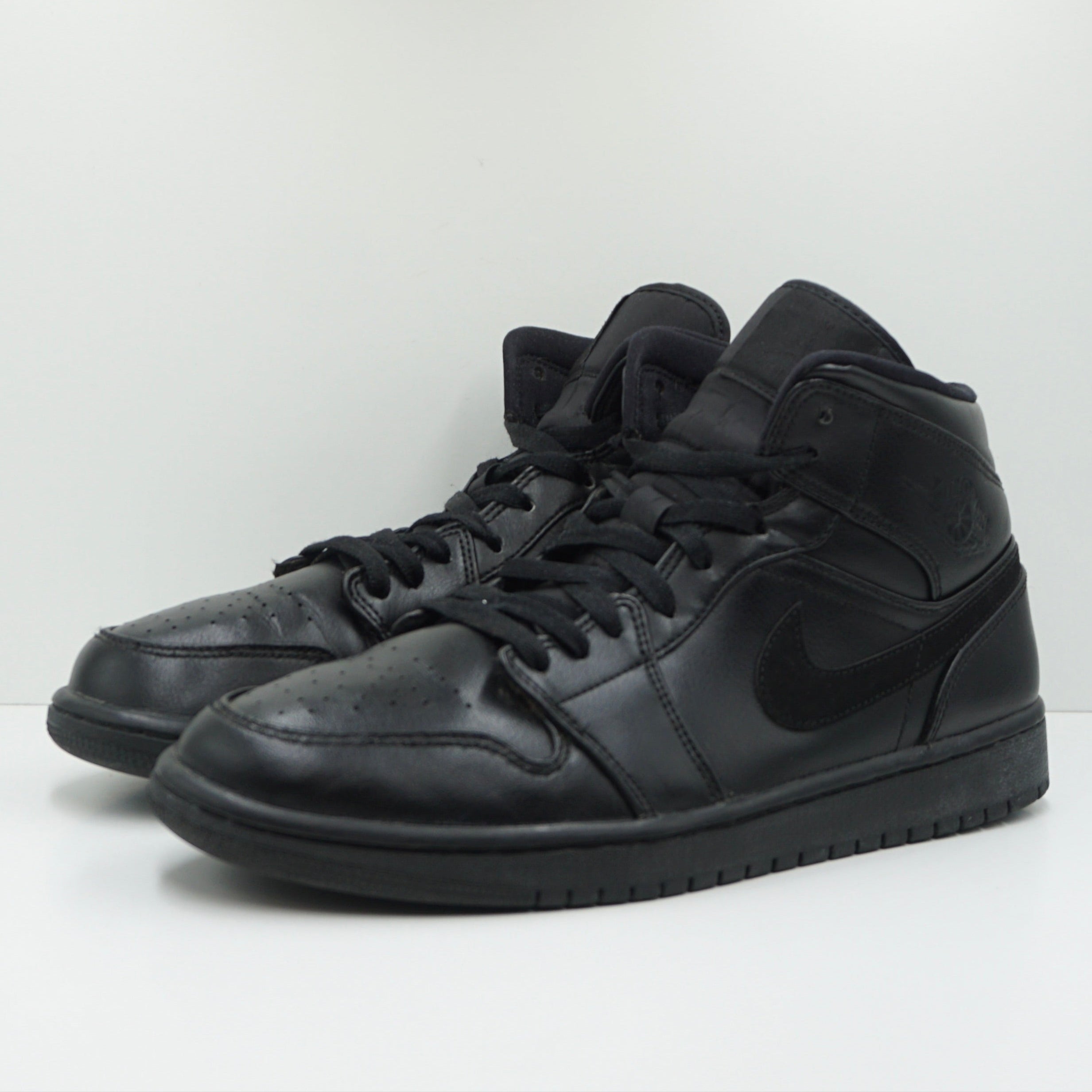 Jordan 1 Mid Black
