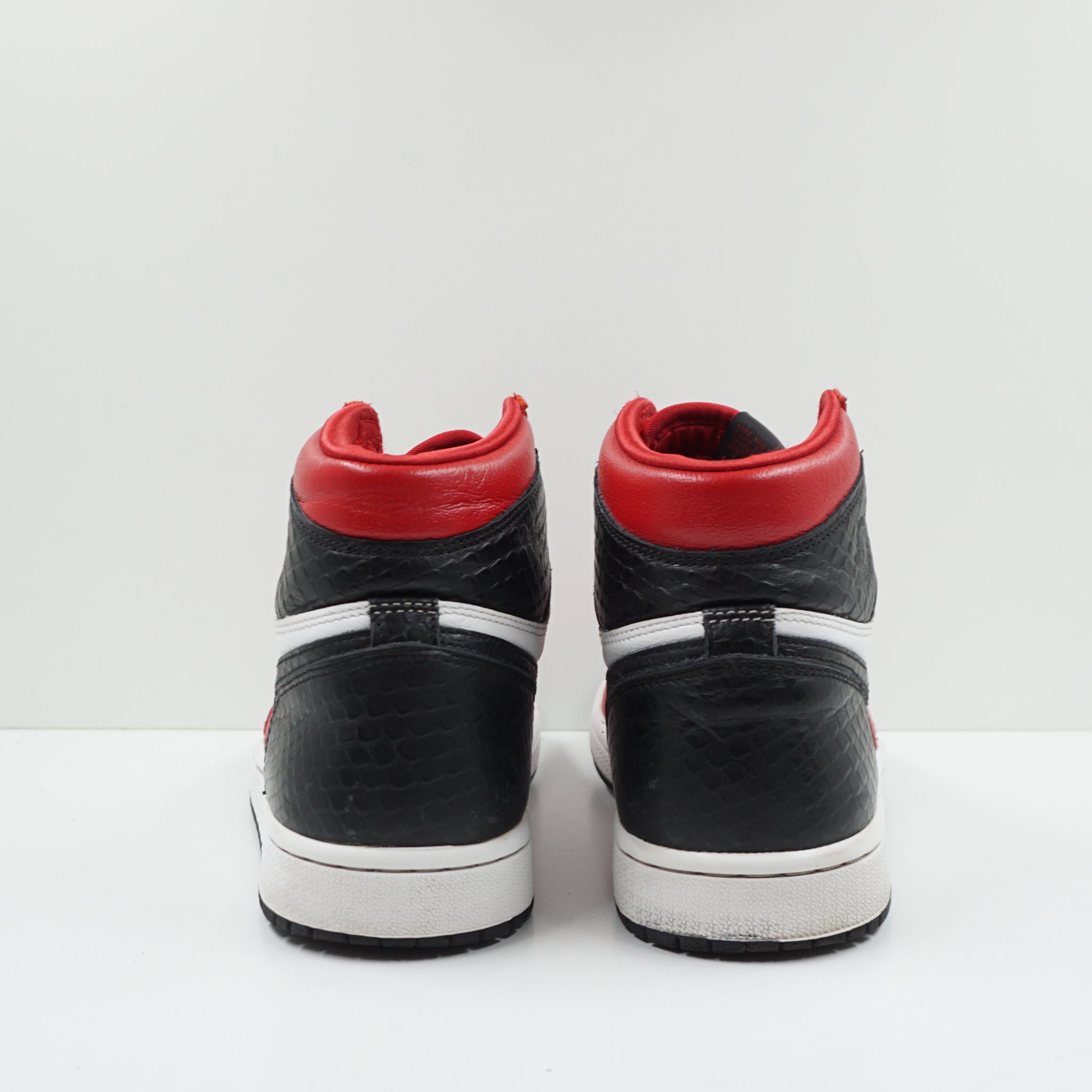 Jordan 1 Retro High Satin Snake Chicago (W)