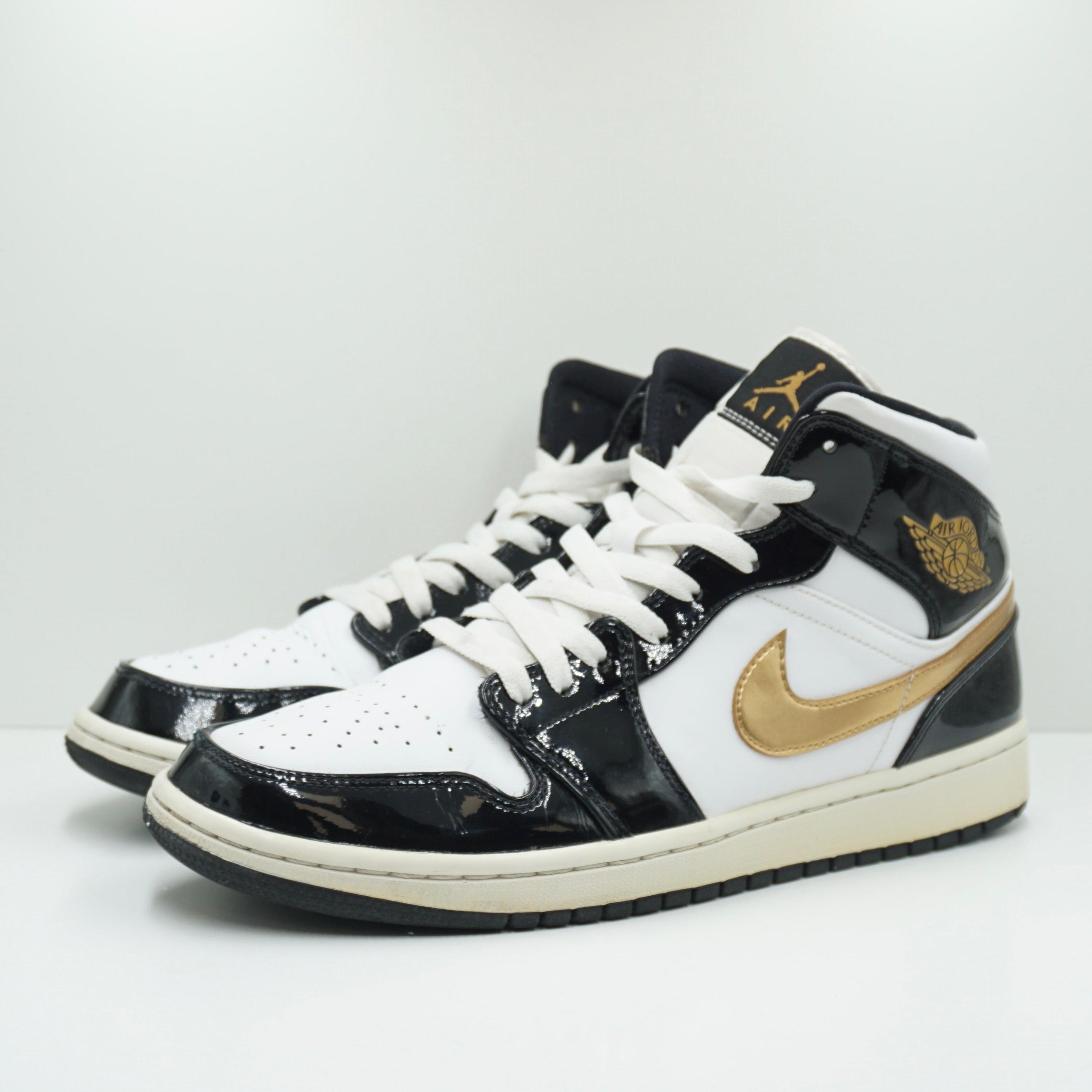 Jordan 1 Mid Patent Black White Gold