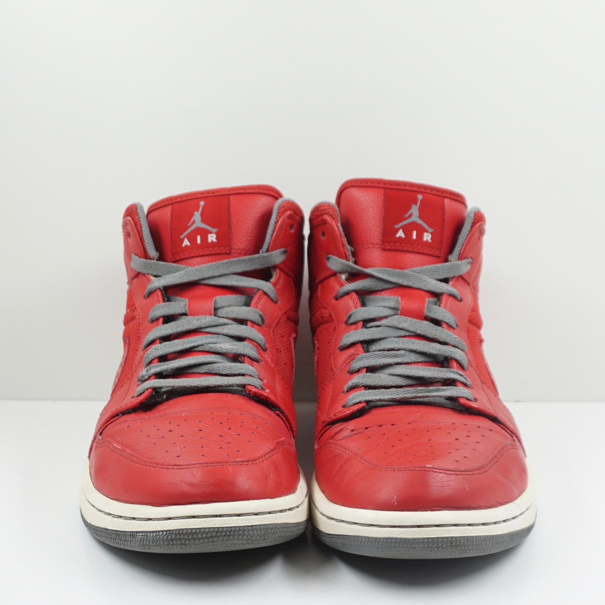 Jordan 1 Mid Phat Varsity Red
