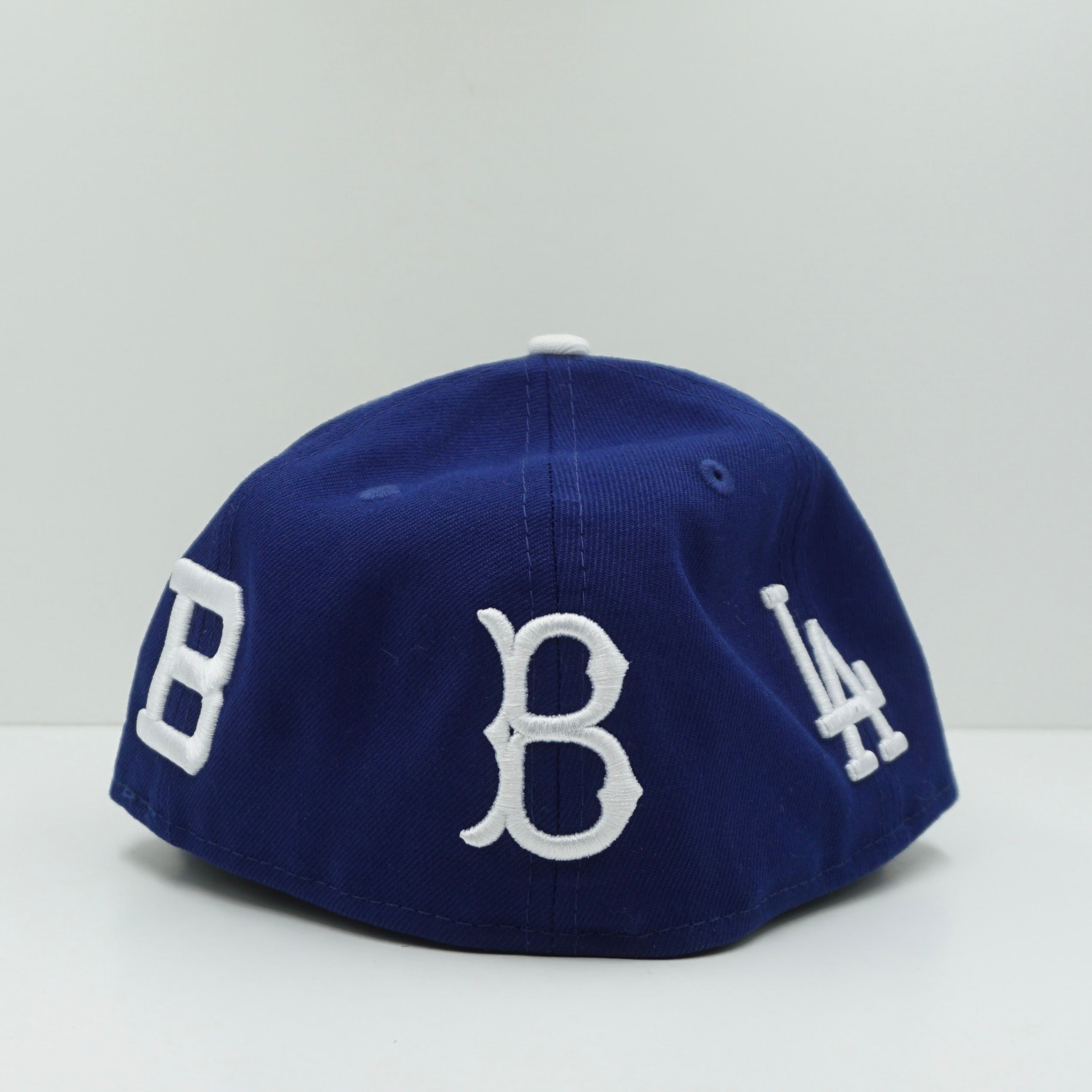 New Era Los Angeles Dodgers All Over Logo Dark Royal Blue Fitted Cap