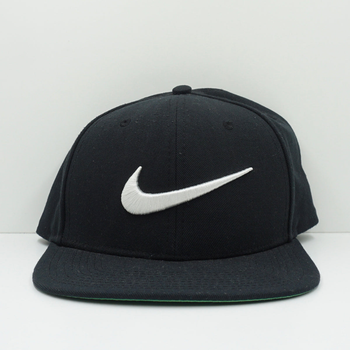 Nike White Swoosh Black Snapback Cap