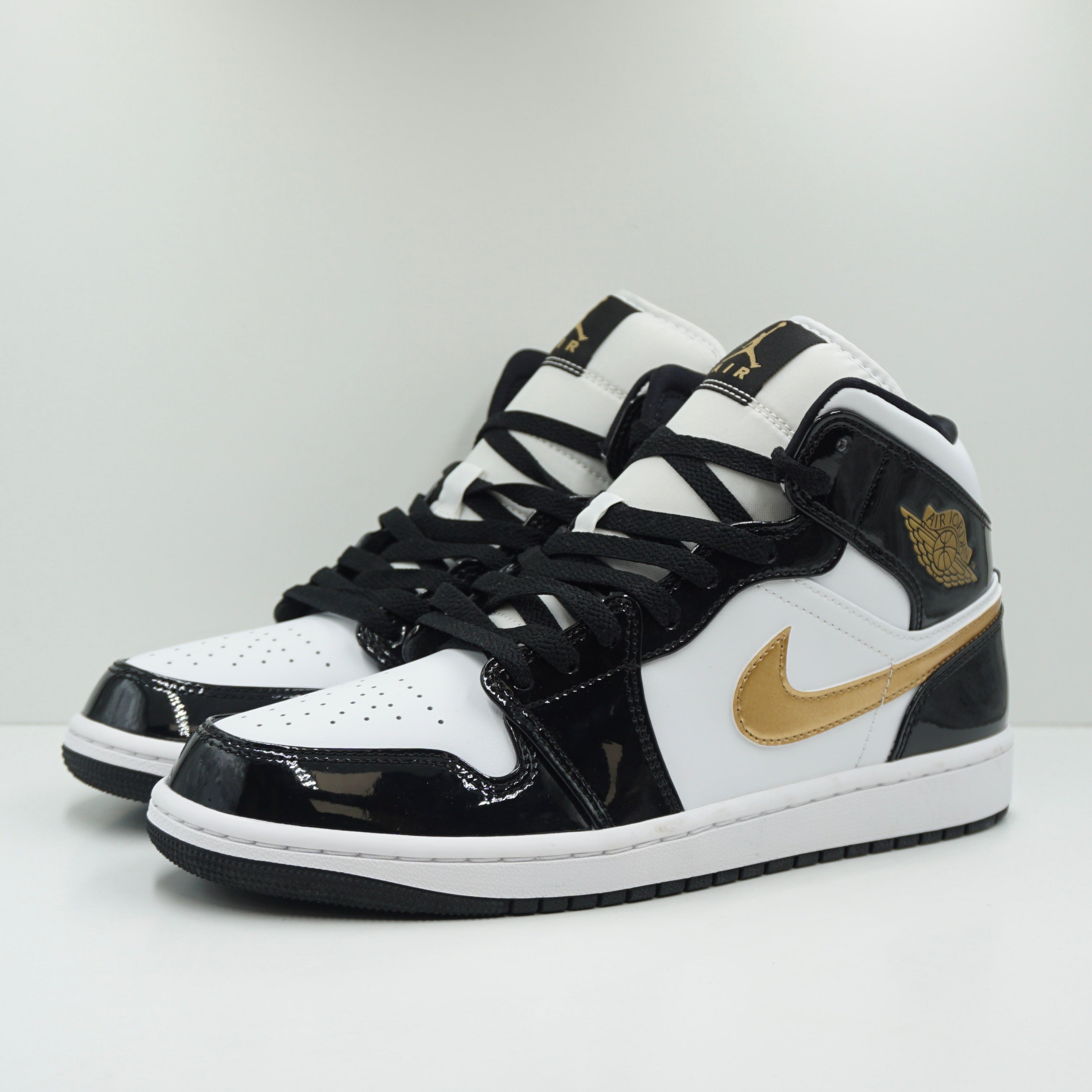 Jordan 1 Mid Patent Black White Gold