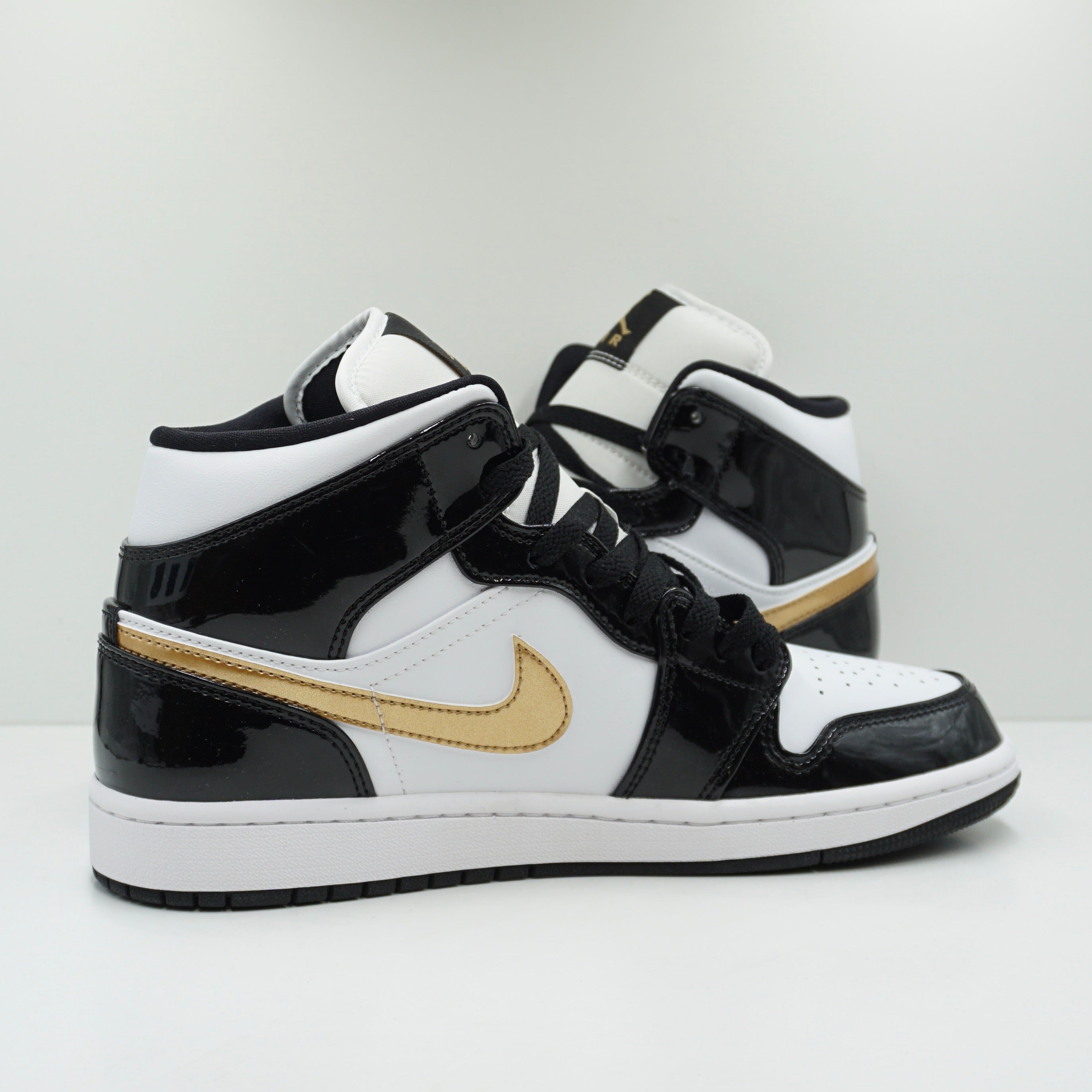 Jordan 1 Mid Patent Black White Gold