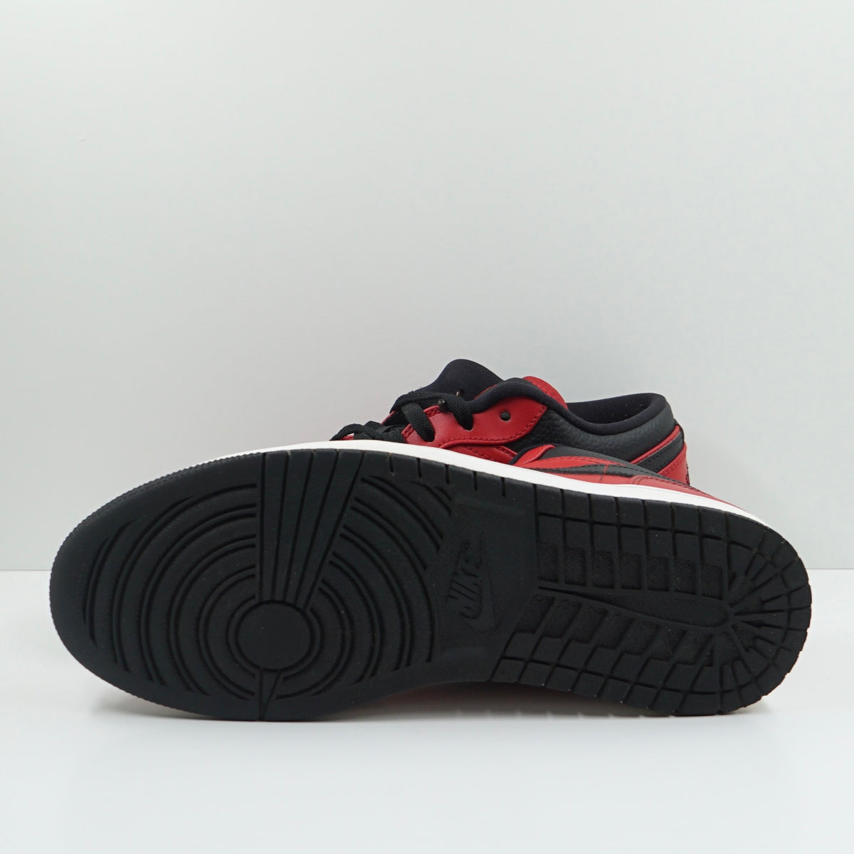 Jordan 1 Low Reverse Bred Pebbled Swoosh