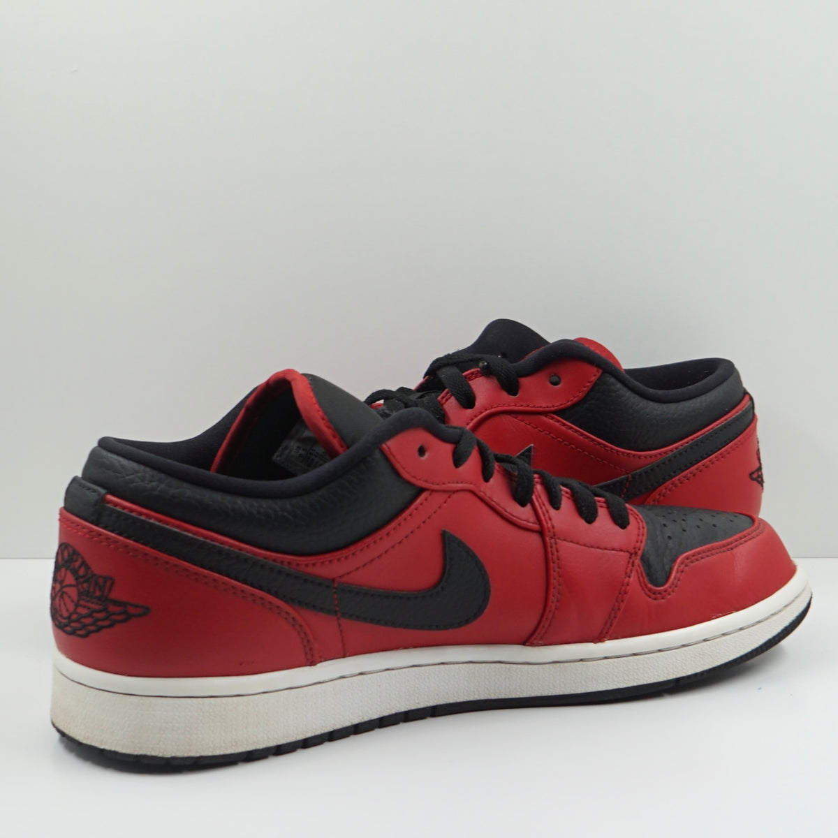 Jordan 1 Low Reverse Bred Pebbled Swoosh